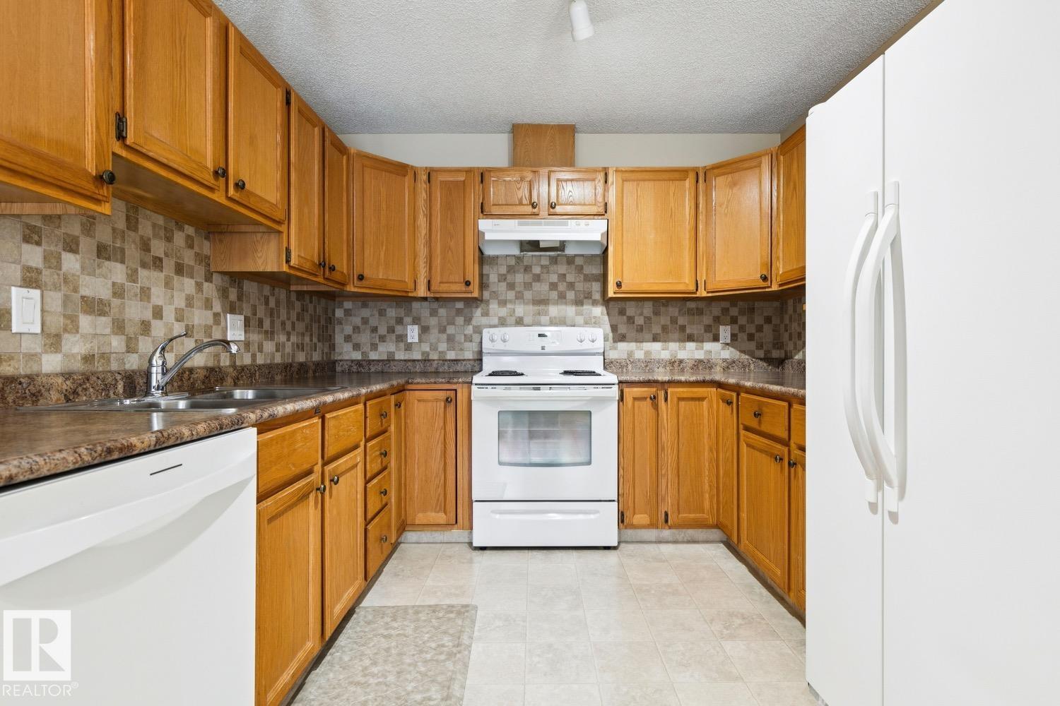 Photo 14 at 38 - 303 Twin Brooks Drive NW, Twin Brooks, Edmonton