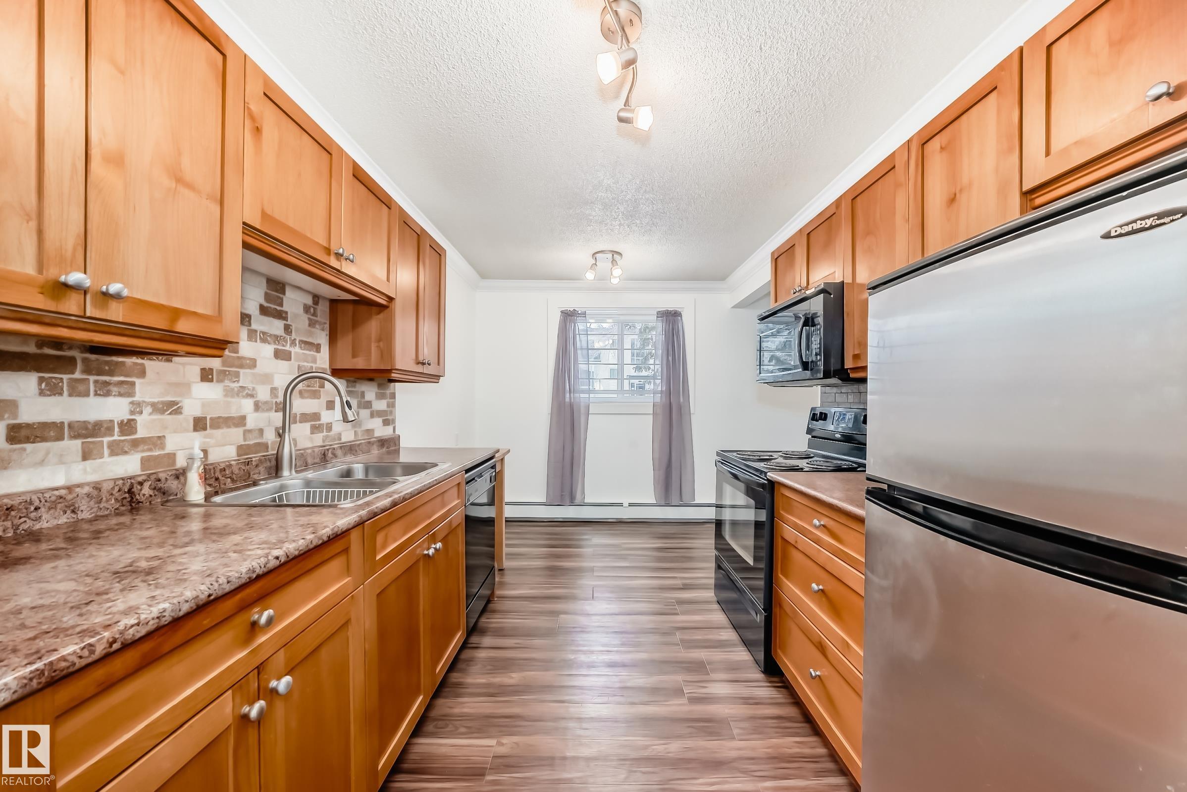 Photo 7 at 102 - 11916 104 Street NW, Westwood, Edmonton