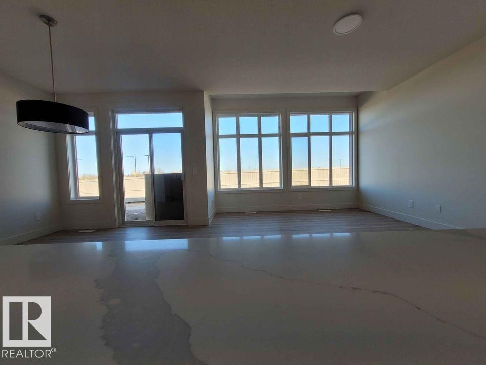 Photo 7 at 1009 Goldfinch Way NW, Kinglet Gardens, Edmonton