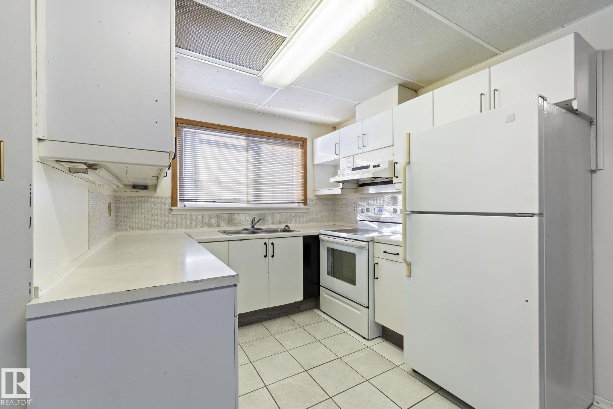 Photo 6 at 12023 137 Avenue NW, Kensington, Edmonton