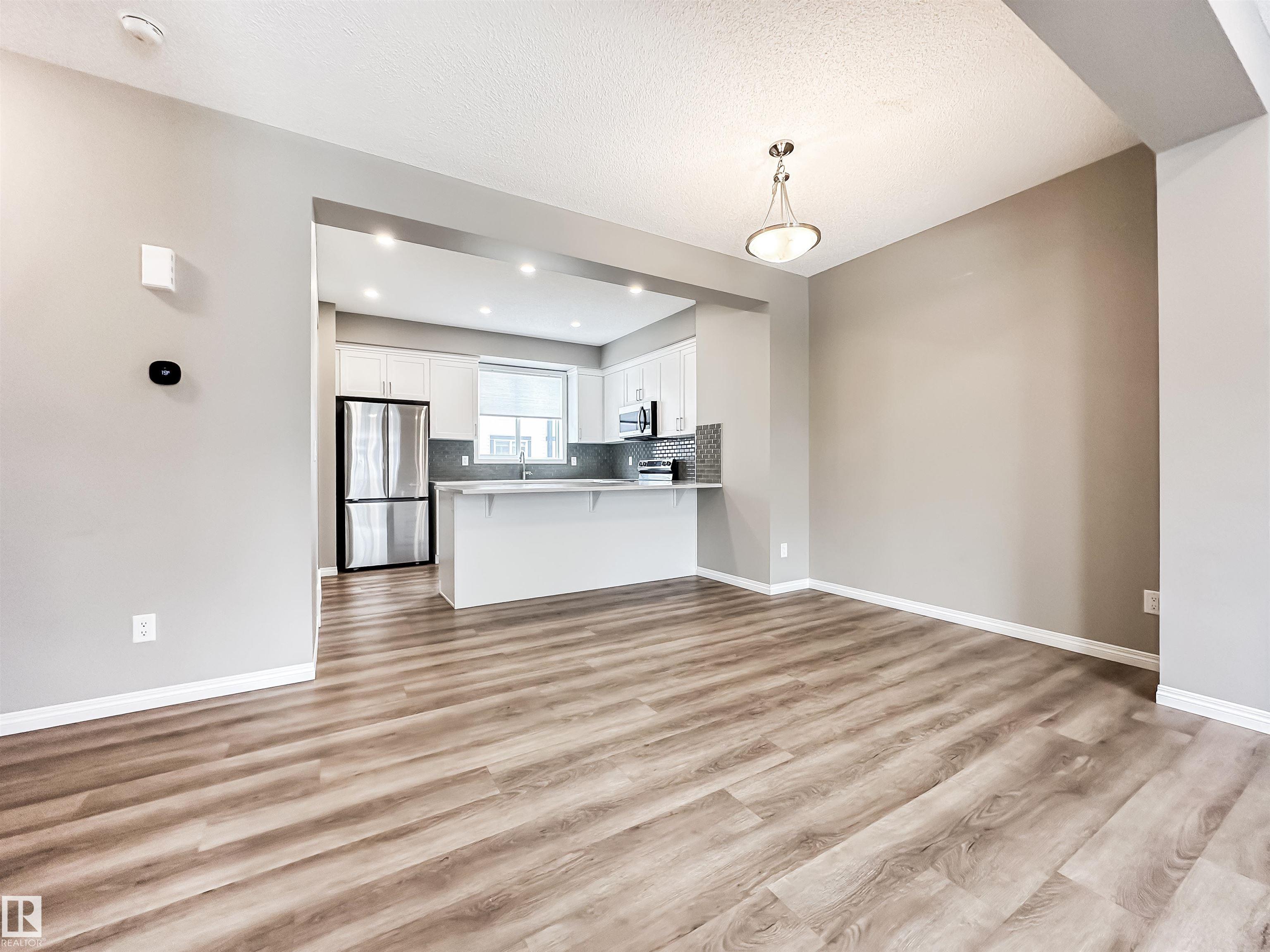 Photo 10 at 100 - 2072 Wonnacott Way SW, Walker, Edmonton