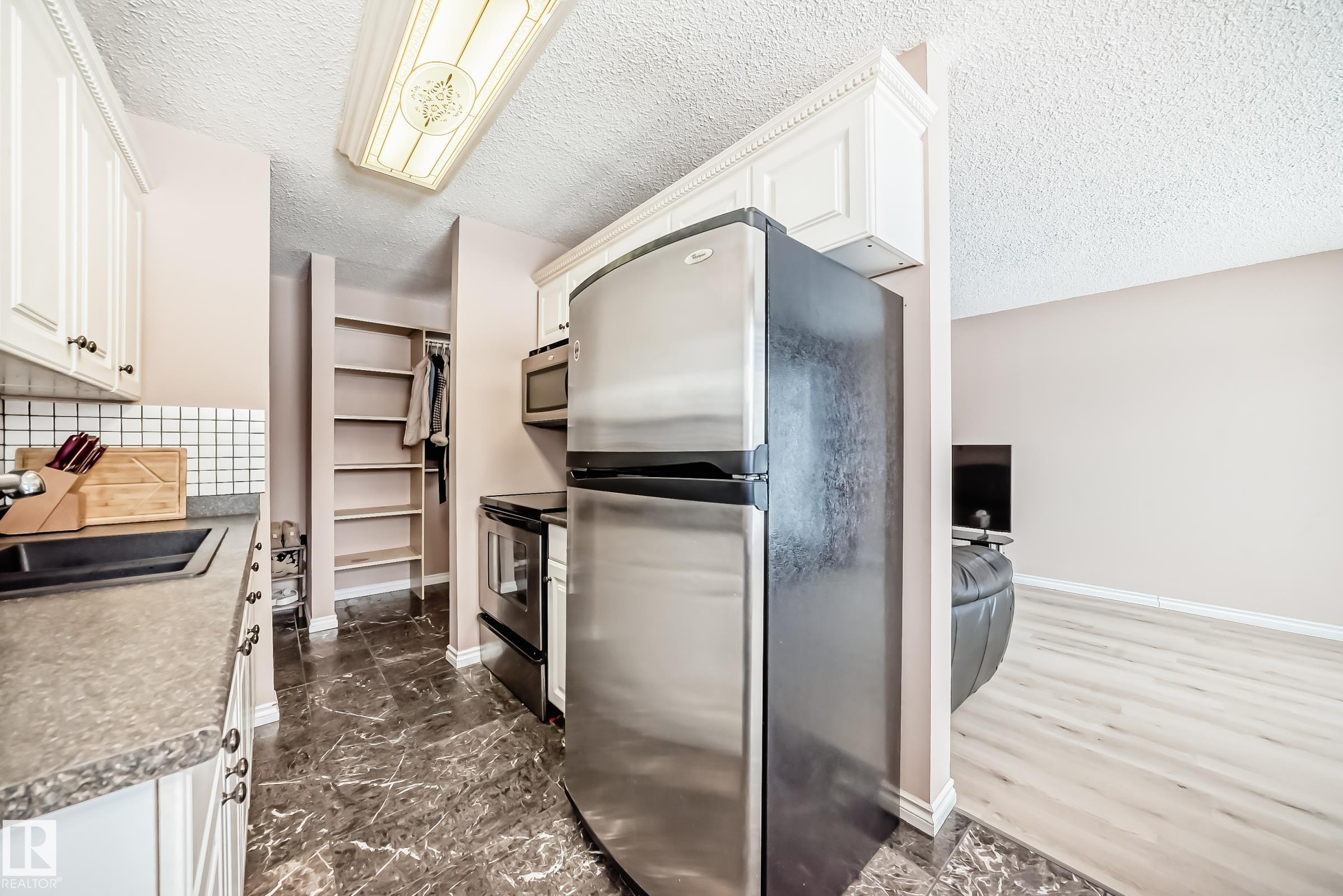 Photo 16 at 121 - 15105 121 Street NW, Caernarvon, Edmonton