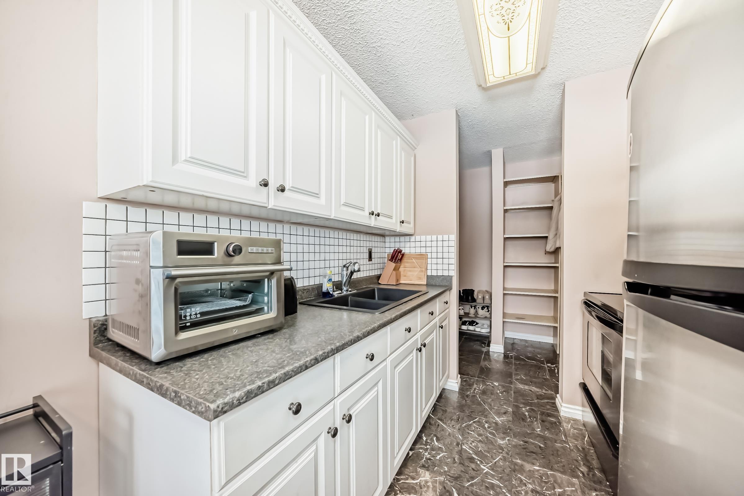 Photo 17 at 121 - 15105 121 Street NW, Caernarvon, Edmonton