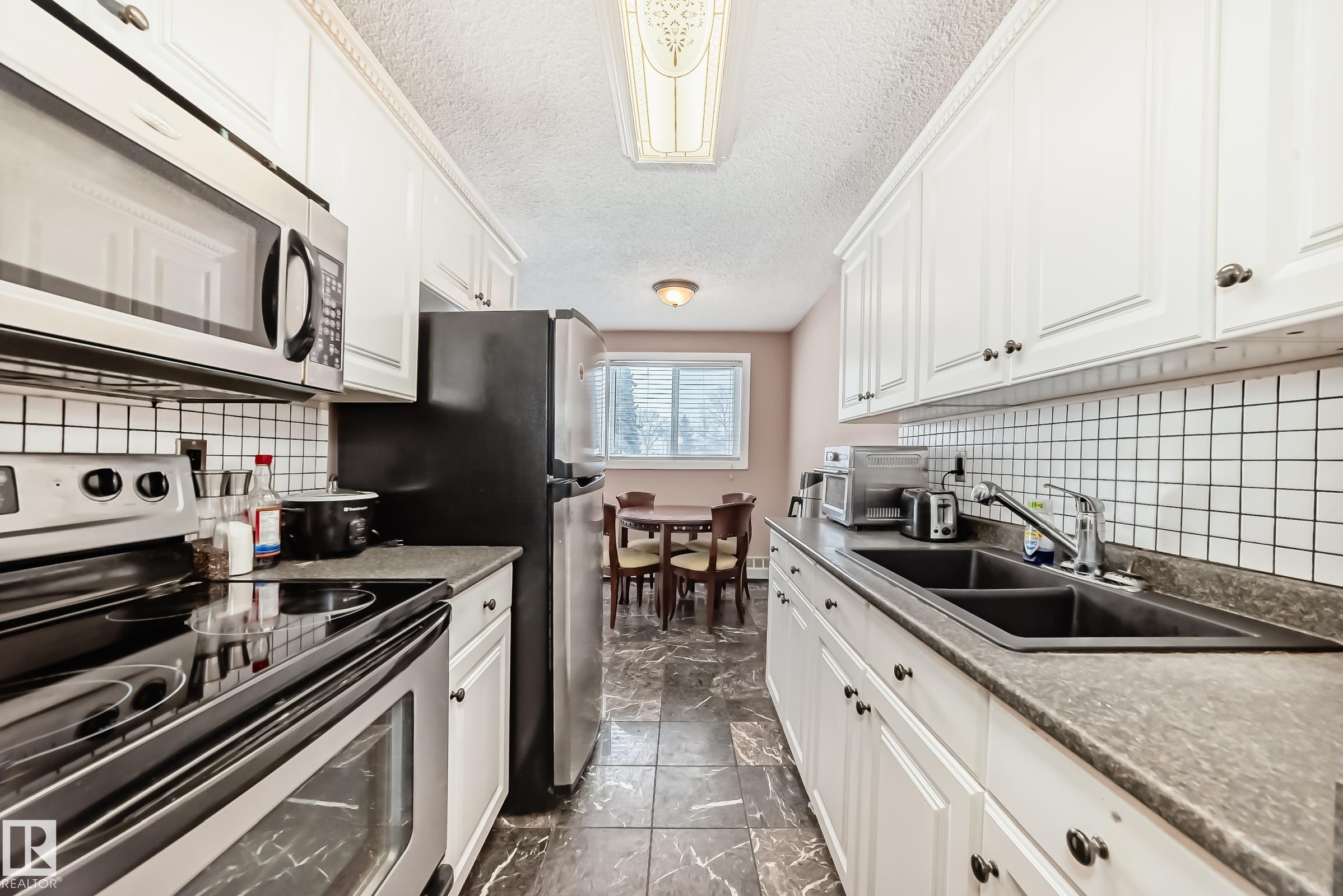 Photo 19 at 121 - 15105 121 Street NW, Caernarvon, Edmonton