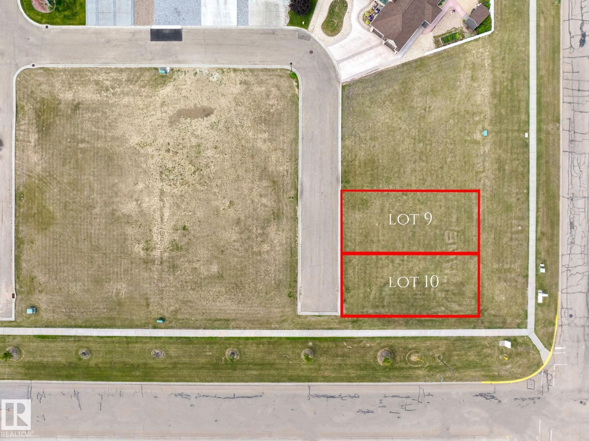 Rare opportunity to purchase one or two side-by-side vacant lots in a desirable 55+ bare land condominium community in Vegreville. Build your dream home within walking distance to shopping and everyday amenities, while enjoying the privacy of a quiet complex with a single access point in and out. A well-positioned setting for low-maintenance, peaceful living in an established community.