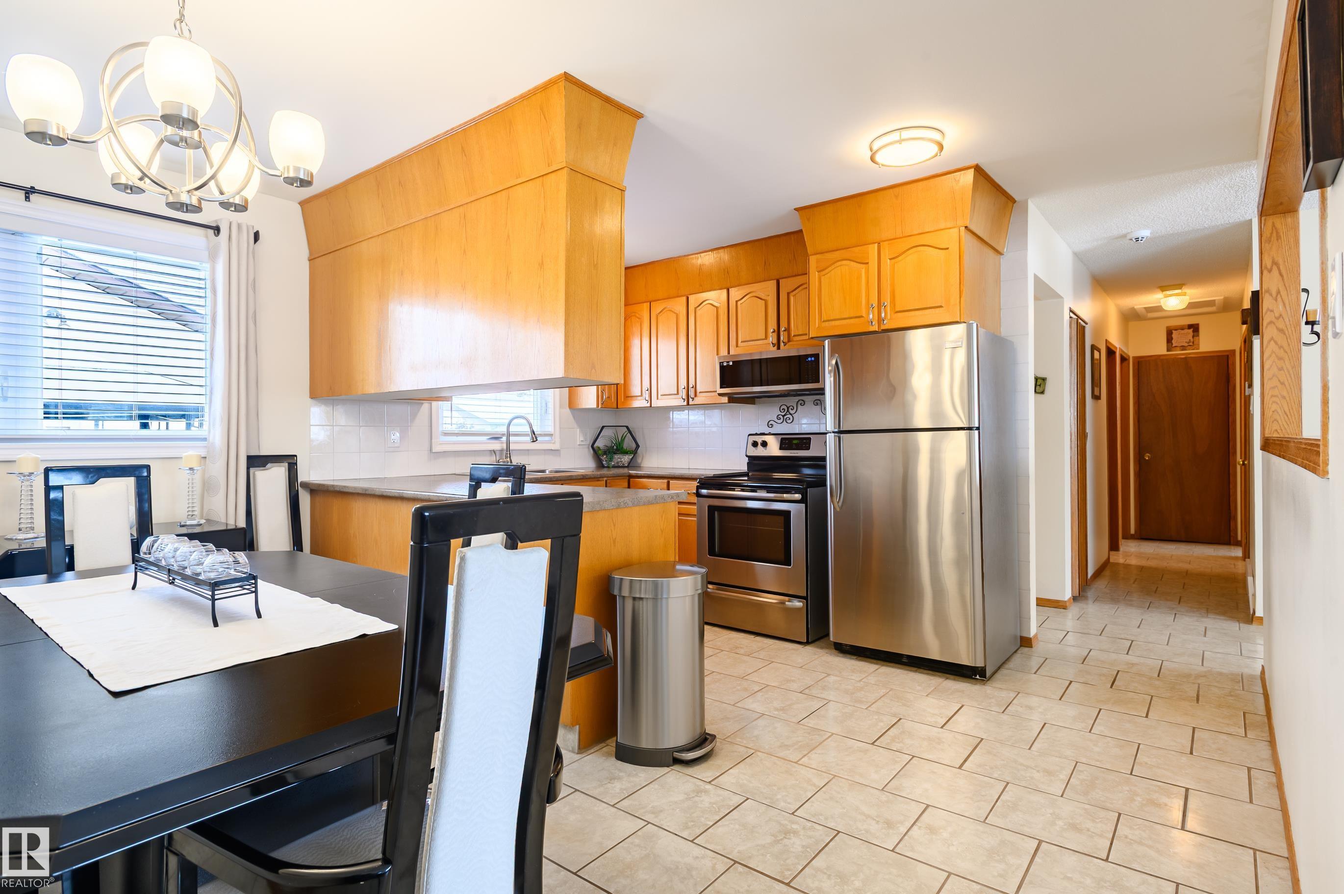 Photo 12 at 13420 113a Street NW, Kensington, Edmonton