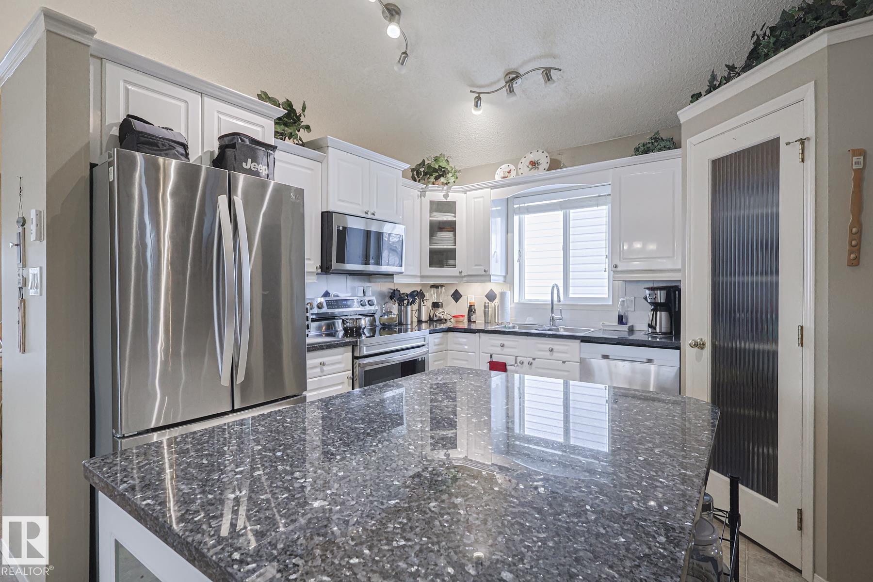 Photo 12 at 21304 88 Avenue NW, Suder Greens, Edmonton