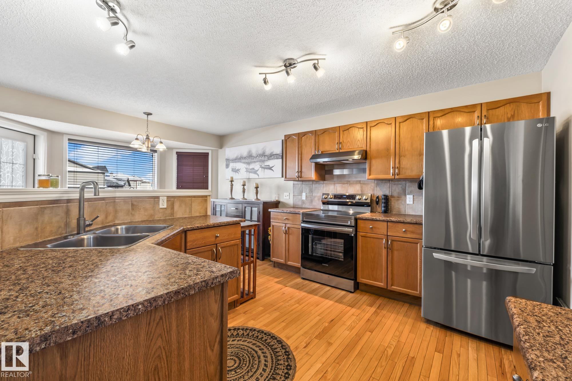 Photo 6 at 5468 162b Avenue NW, Hollick-Kenyon, Edmonton