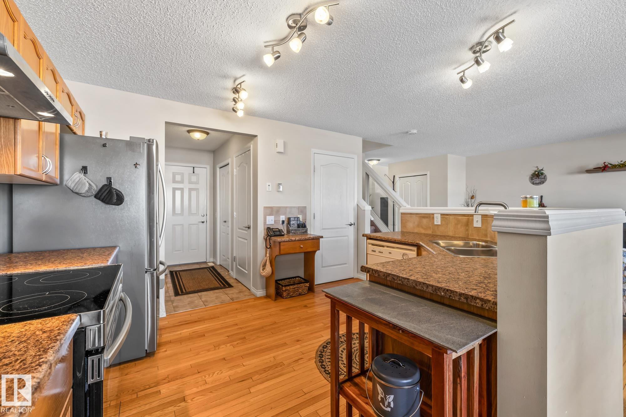 Photo 8 at 5468 162b Avenue NW, Hollick-Kenyon, Edmonton