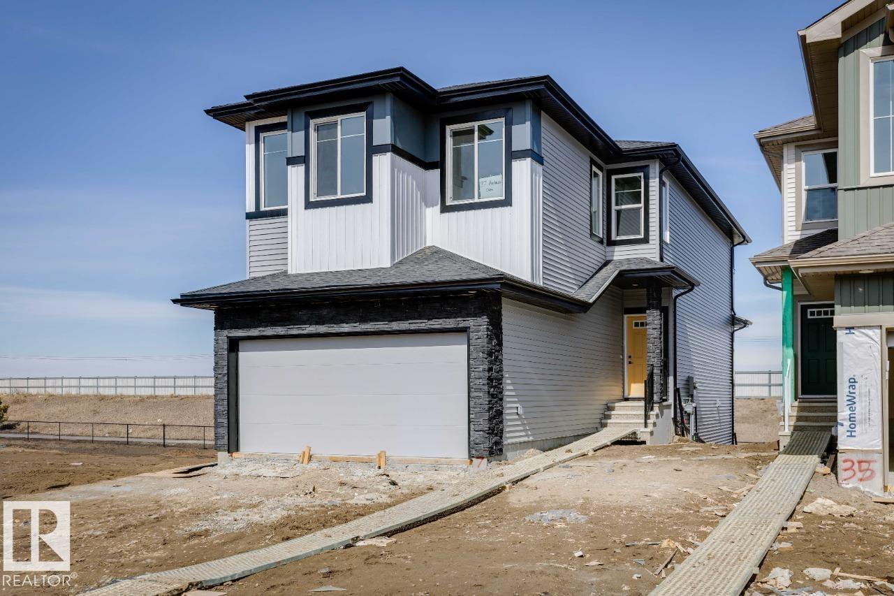 This meticulously crafted home features a walkout basement, offering added natural light, future development potential, and direct access to your backyard. The open-concept main floor flows seamlessly through the kitchen, dining, and living spaces?perfect for entertaining and everyday living. Expansive windows fill the home with natural light, creating a warm and inviting atmosphere. Thoughtfully designed with both comfort and functionality in mind, the Victor offers modern finishes, spacious living areas, and a layout that truly supports today?s family lifestyle?all in one of Spruce Grove?s most desirable communities. *** PHOTOS ARE REPRESENTATIVE***