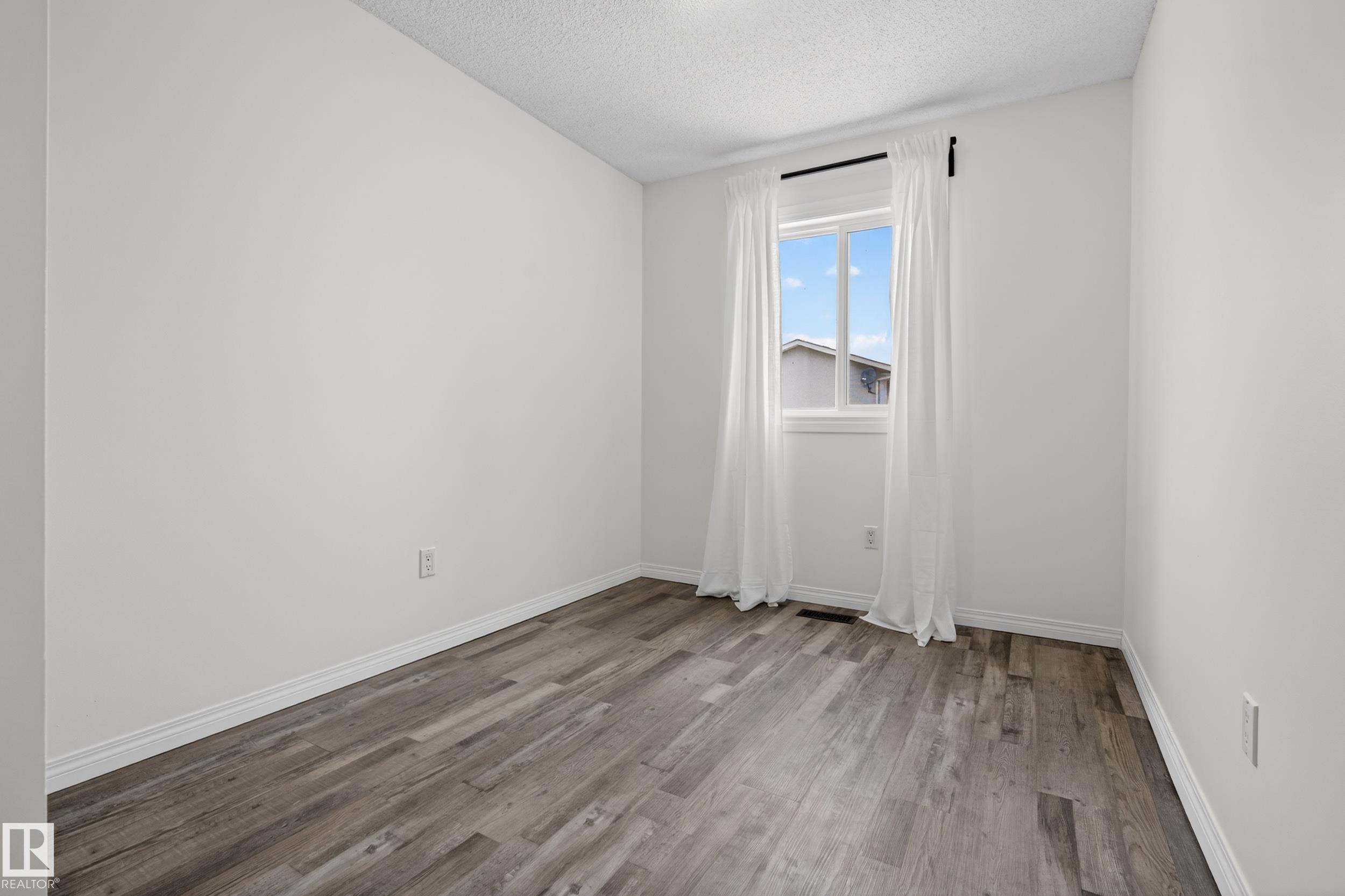 Photo 13 at 18716 57 Avenue NW, Jamieson Place, Edmonton