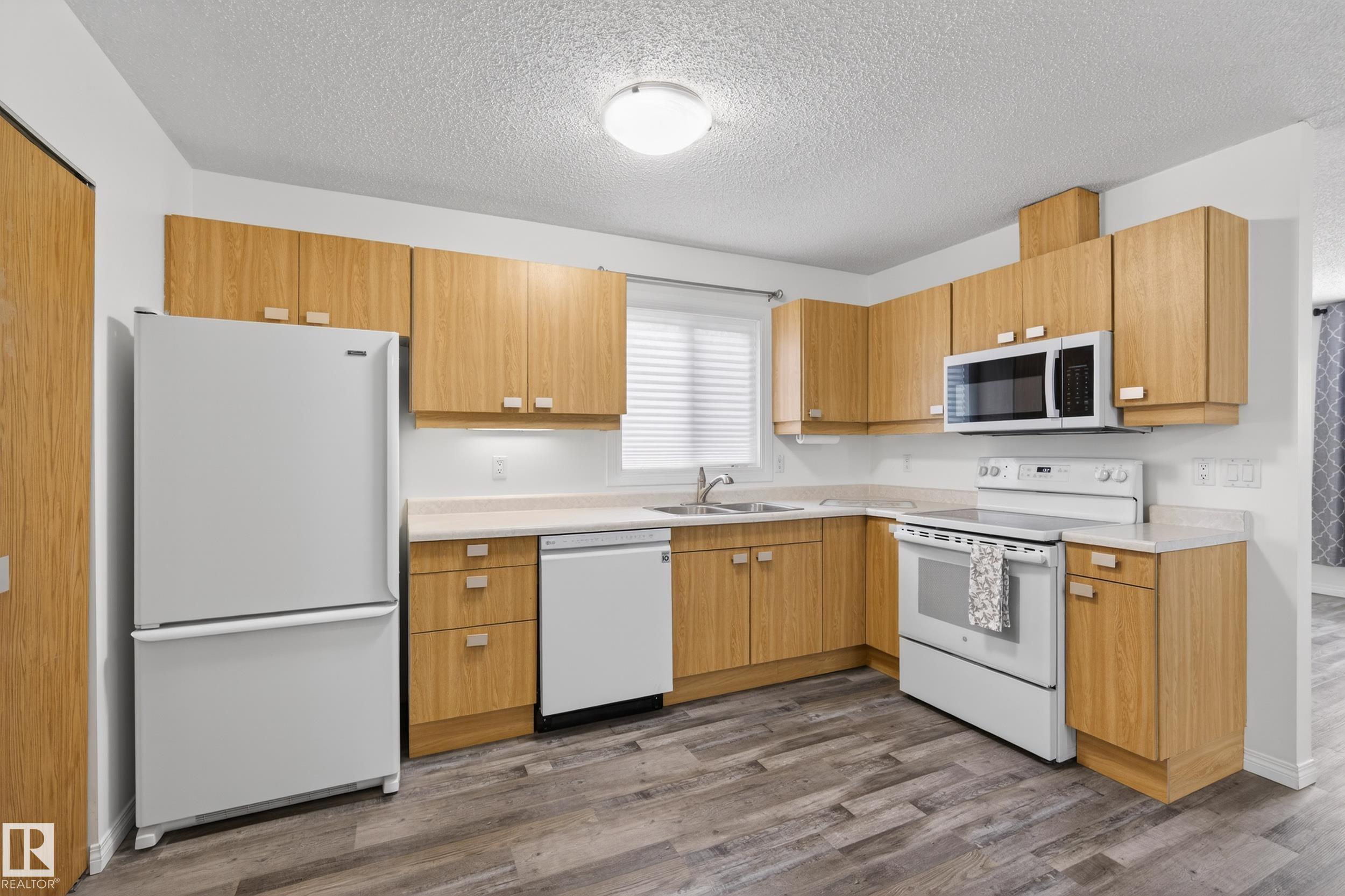 Photo 8 at 18716 57 Avenue NW, Jamieson Place, Edmonton