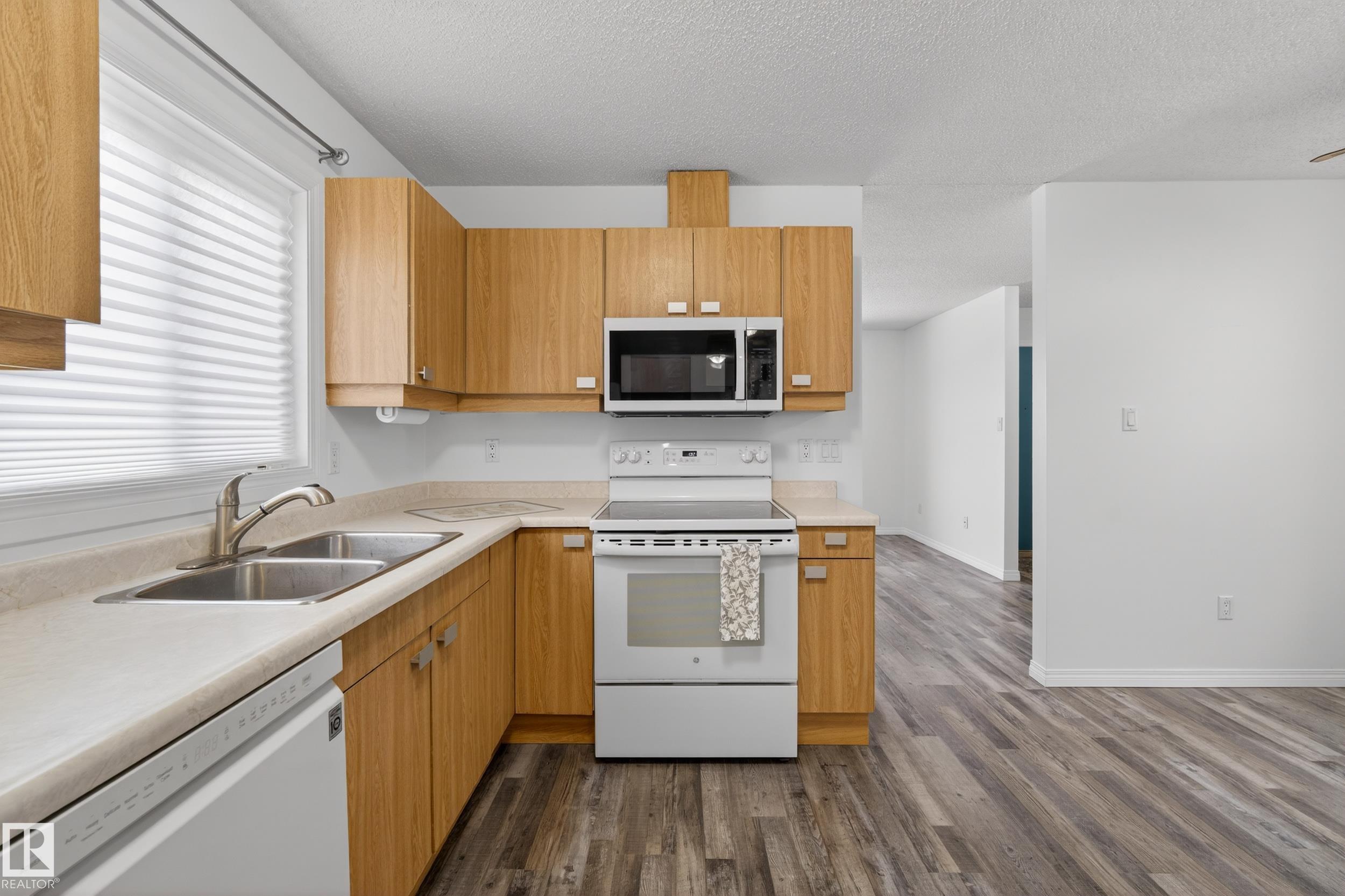 Photo 9 at 18716 57 Avenue NW, Jamieson Place, Edmonton