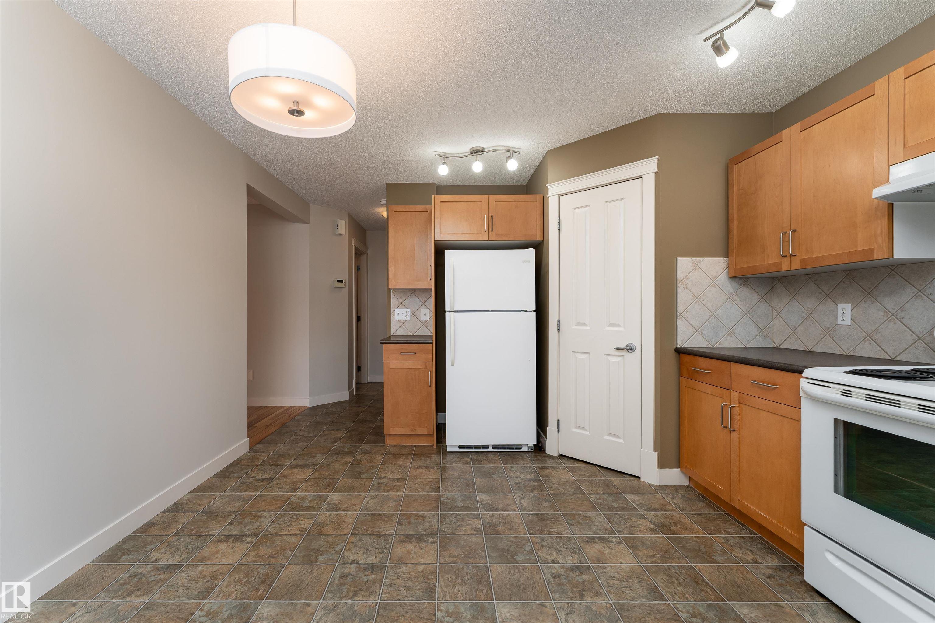 Photo 9 at 10904 72 Avenue NW, McKernan, Edmonton