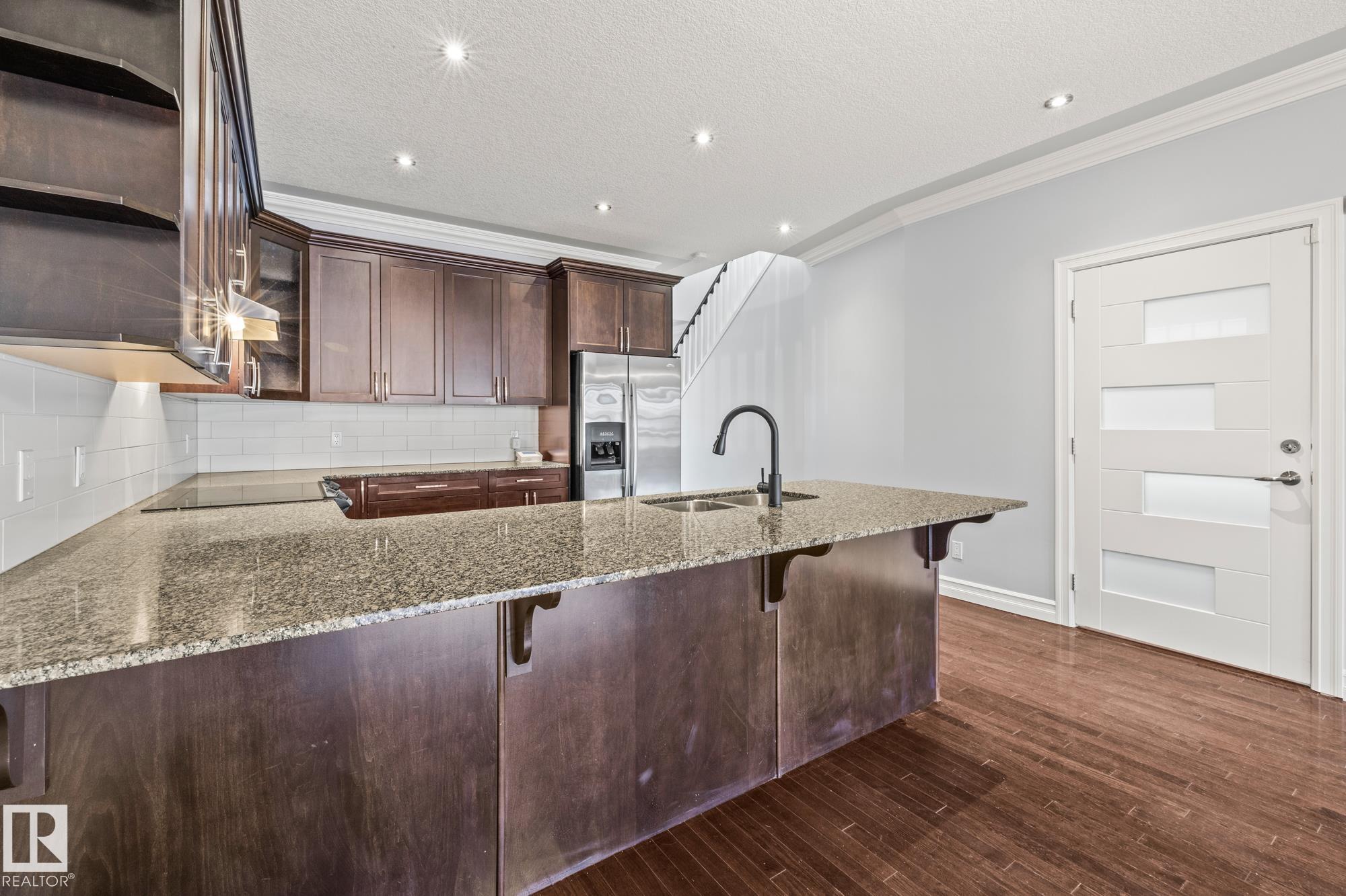 Photo 11 at 7317 106 Street NW, Queen Alexandra, Edmonton