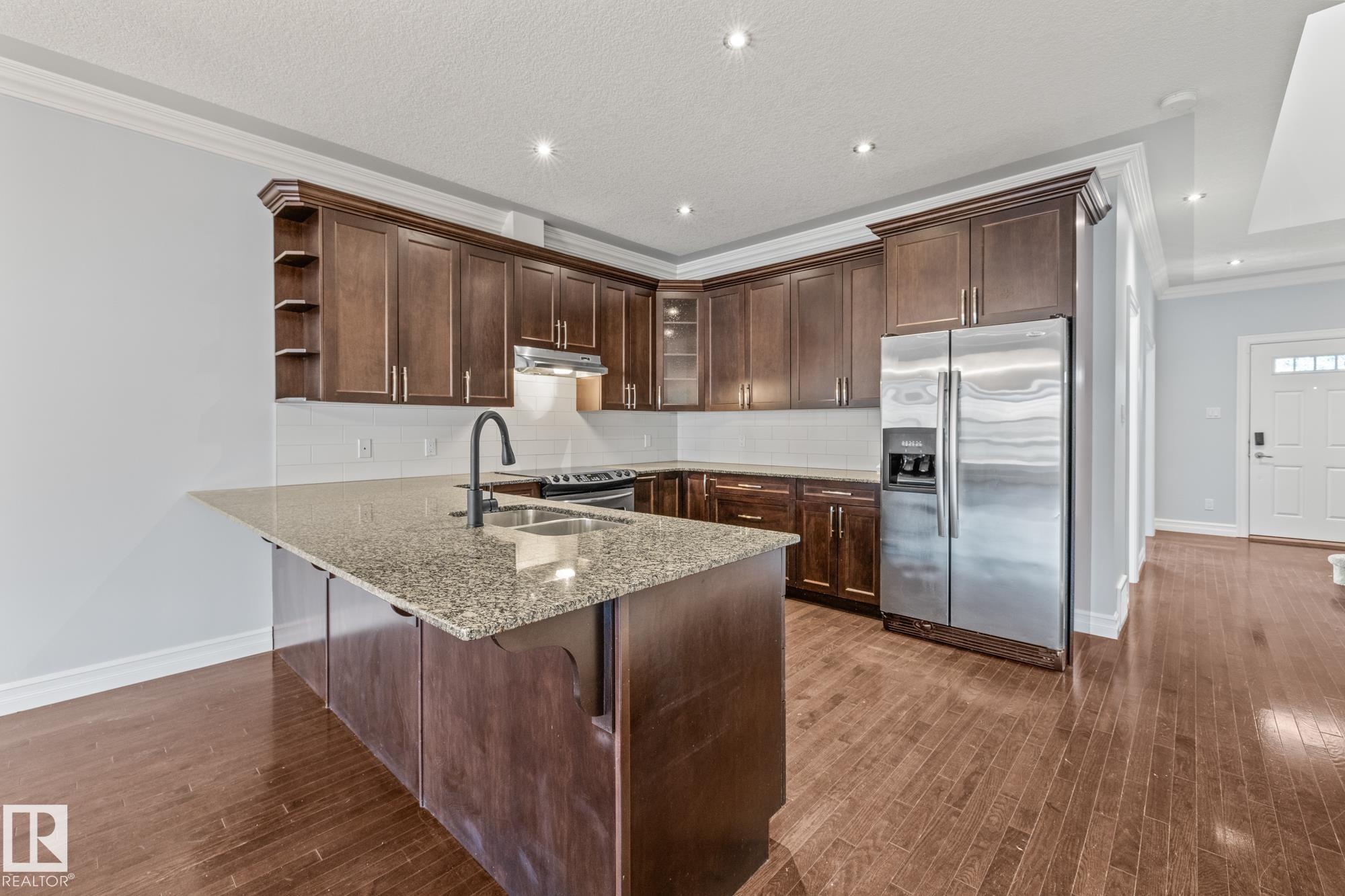 Photo 10 at 7317 106 Street NW, Queen Alexandra, Edmonton