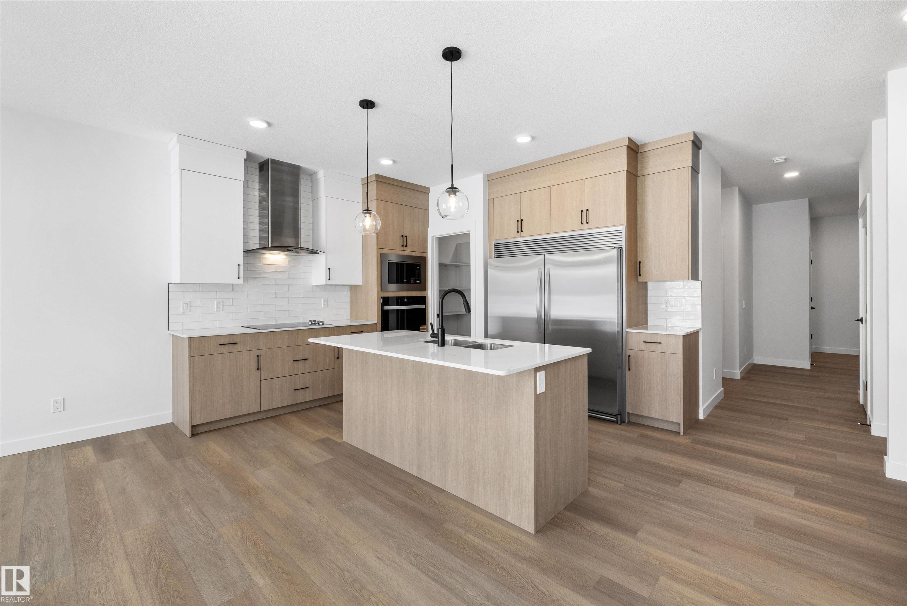 Photo 8 at 1077 Cristall Crescent SW, Chappelle Area, Edmonton