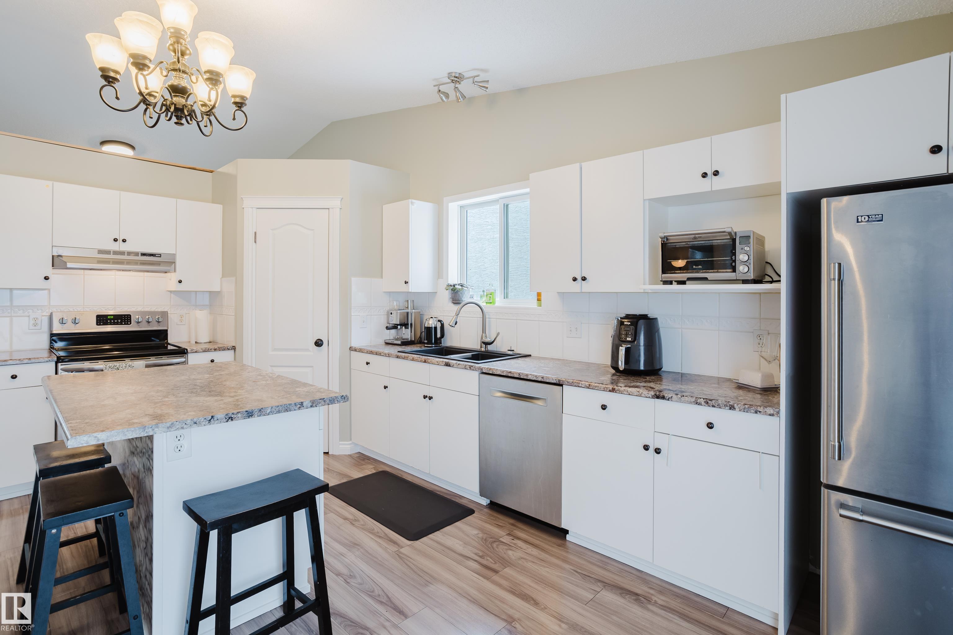 Photo 12 at 13143 37 Street NW, Belmont, Edmonton