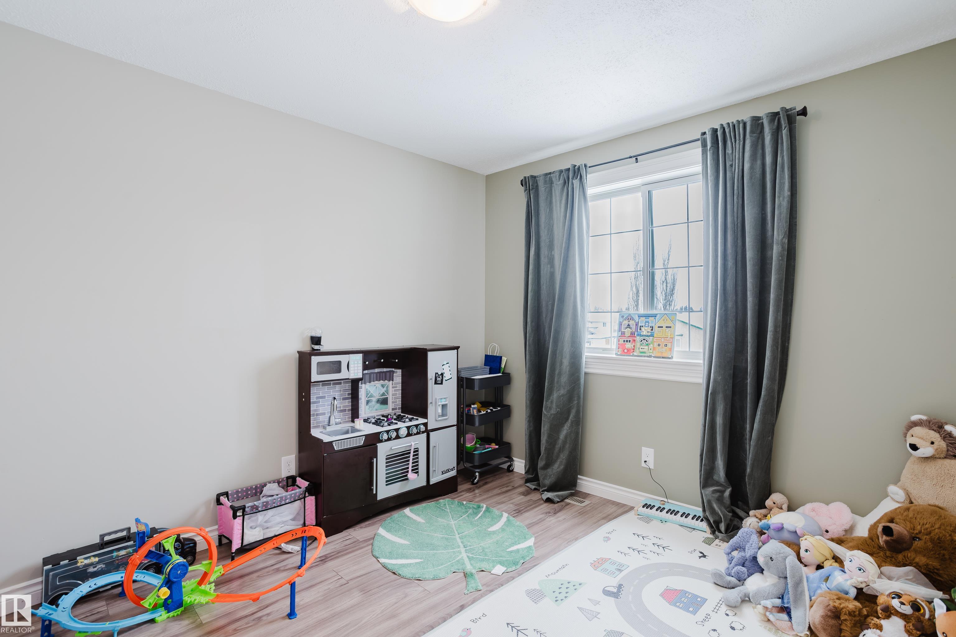 Photo 30 at 13143 37 Street NW, Belmont, Edmonton