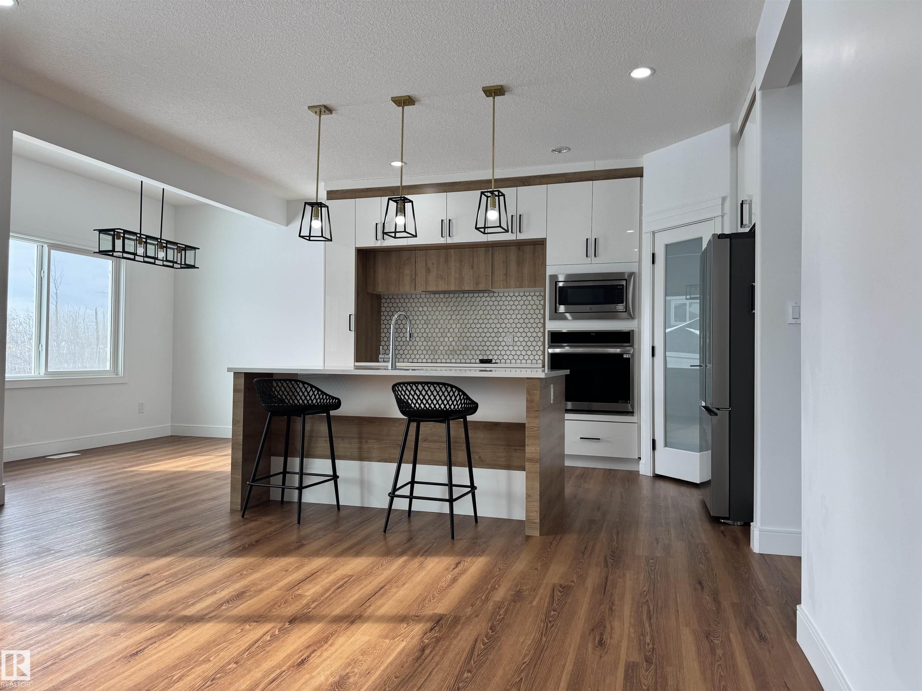 Photo 12 at 1703 152 Avenue NW, Fraser, Edmonton