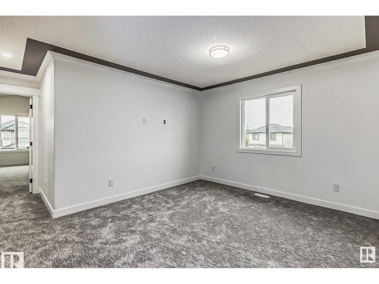 Photo 15 at 1703 152 Avenue NW, Fraser, Edmonton