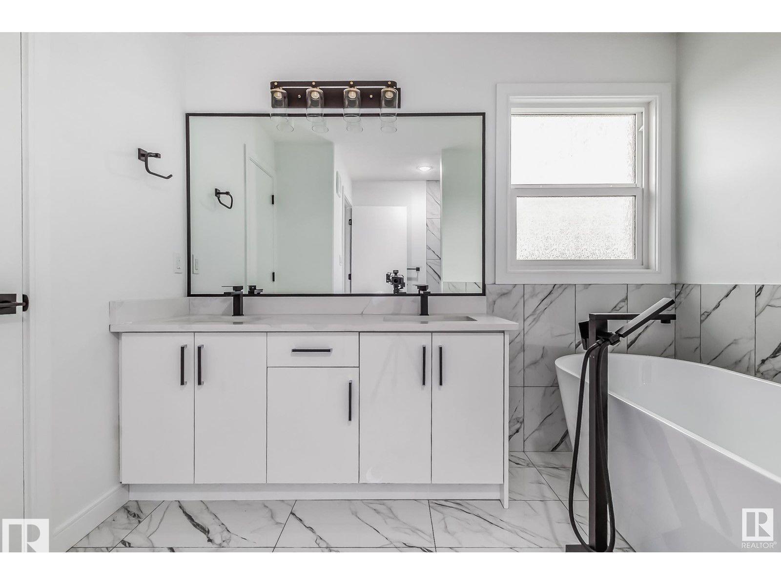 Photo 24 at 1703 152 Avenue NW, Fraser, Edmonton