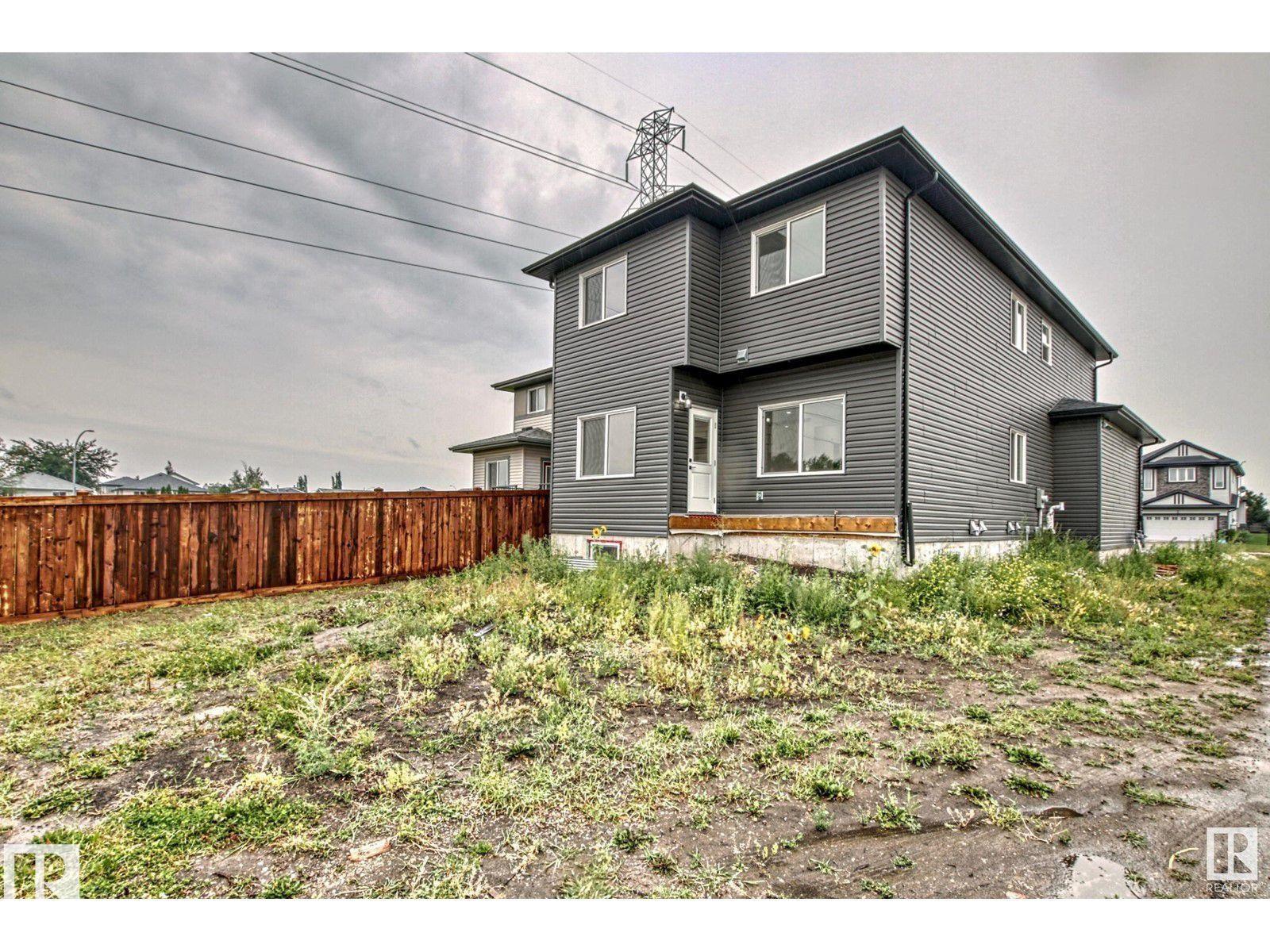 Photo 30 at 1703 152 Avenue NW, Fraser, Edmonton