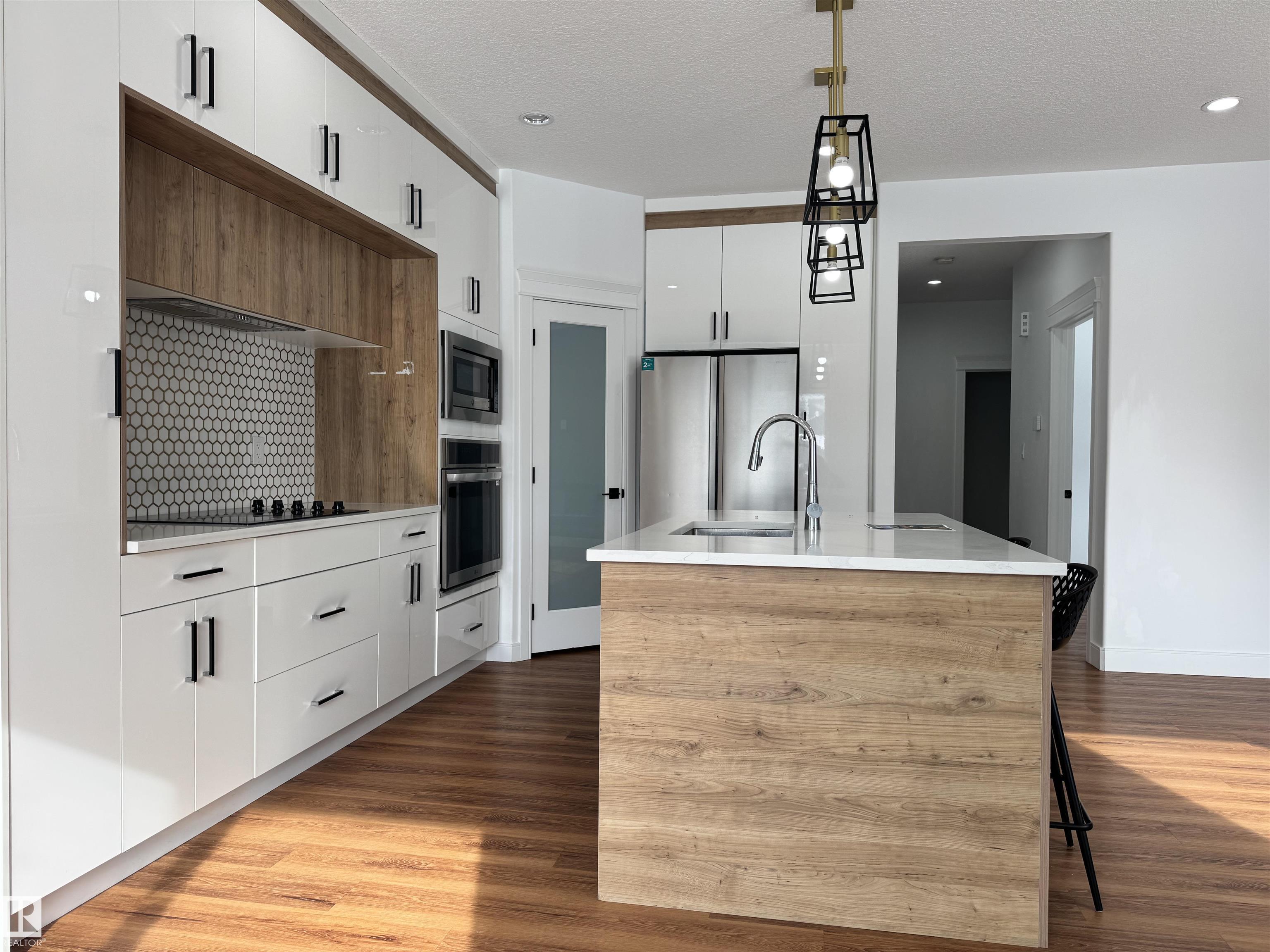 Photo 10 at 1703 152 Avenue NW, Fraser, Edmonton