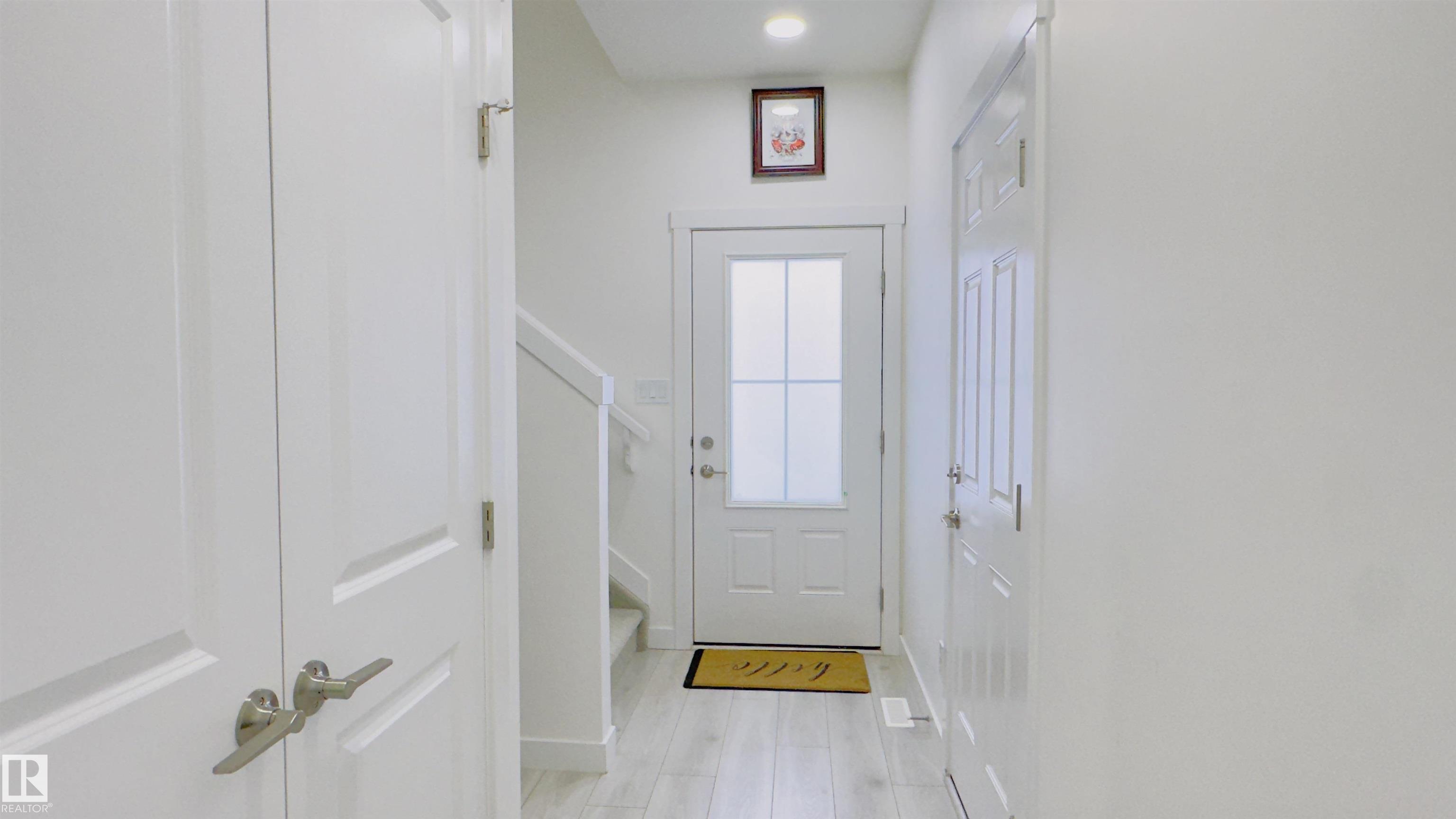 Photo 2 at 21 - 7110 Keswick Common SW, Keswick, Edmonton