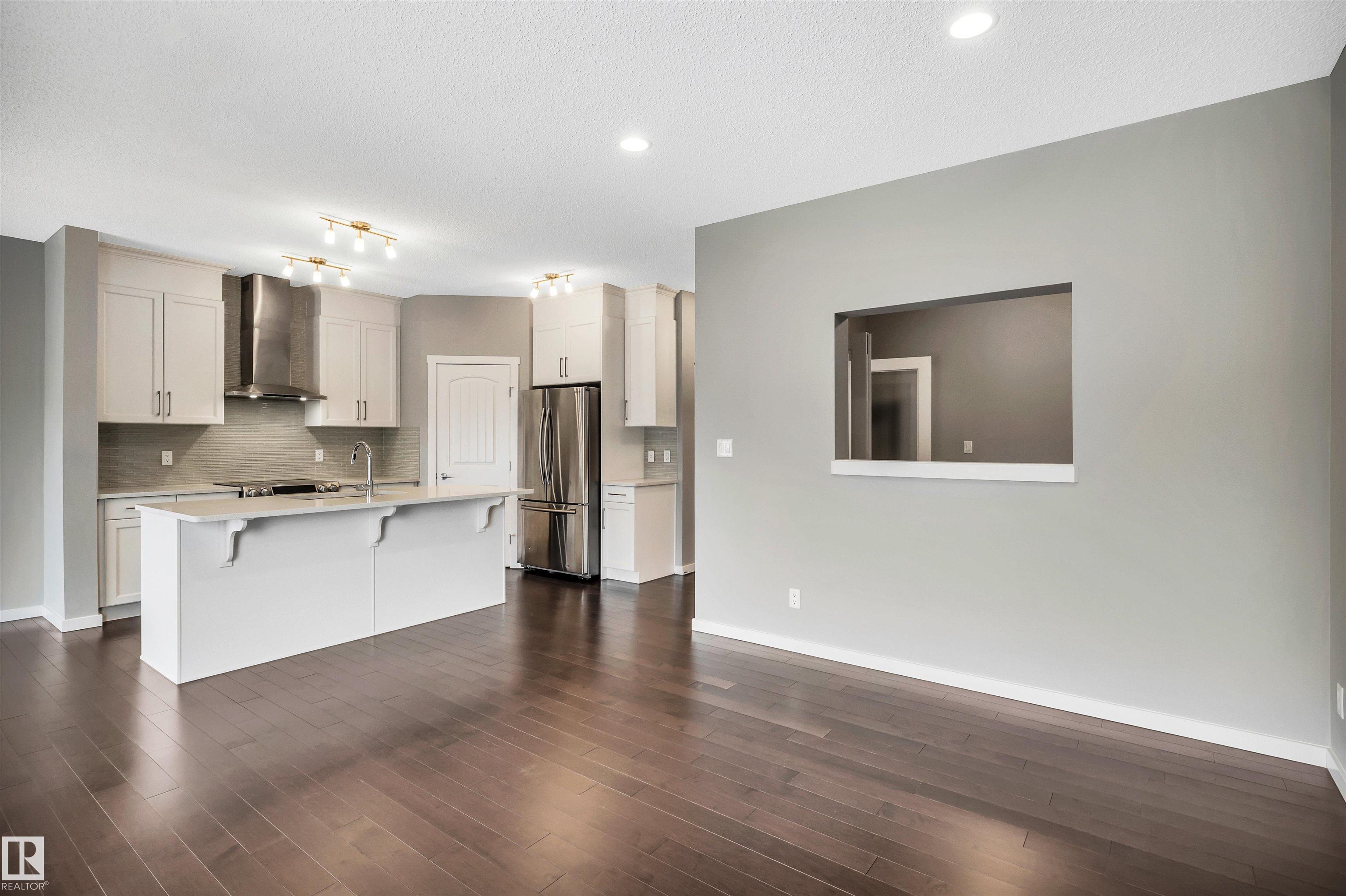 Photo 10 at 4442 5a Street NW, Maple Crest, Edmonton