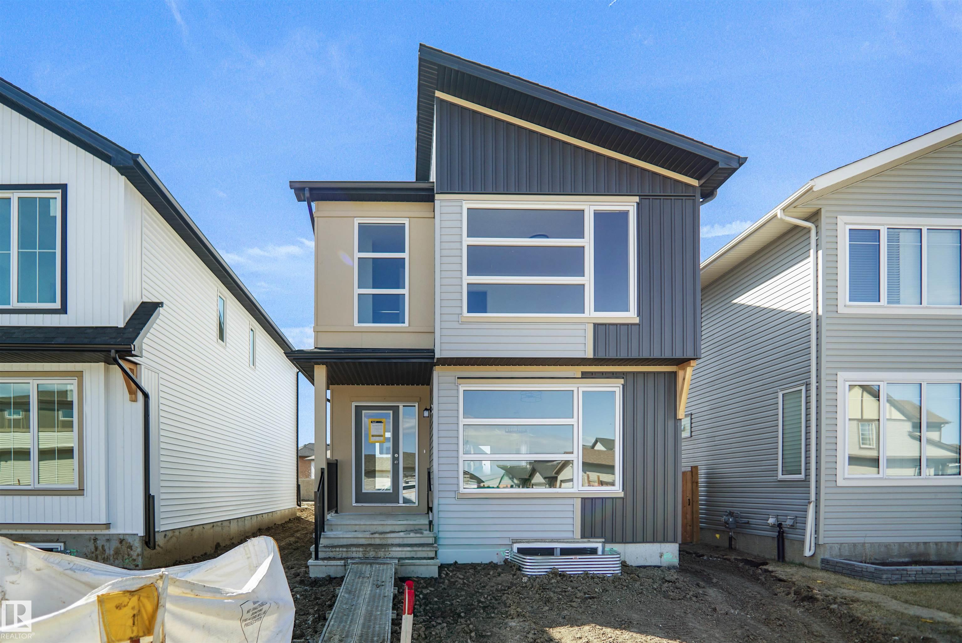 Welcome to the "Brooklyn" built by the award-winning builder Pacesetter homes and is located in the heart of Crystalina Nera. The Brooklyn model is 1,648 square feet and has a stunning floorplan with plenty of open space. Three bedrooms and two-and-a-half bathrooms are laid out to maximize functionality, making way for a spacious bonus room area, upstairs laundry, and an open to above staircase. The kitchen has a large island which is next to a sizeable nook and great room with stunning 3 panel windows. Close to all amenities and easy access to the Anthony Henday and Manning Drive. This home also ha a side separate entrance and two large windows perfect for a future income suite. *** Home is under construction and almost complete the photos being used are from the exact home recently built but colors may vary, home should be completed by end of May/ June  2026 ***