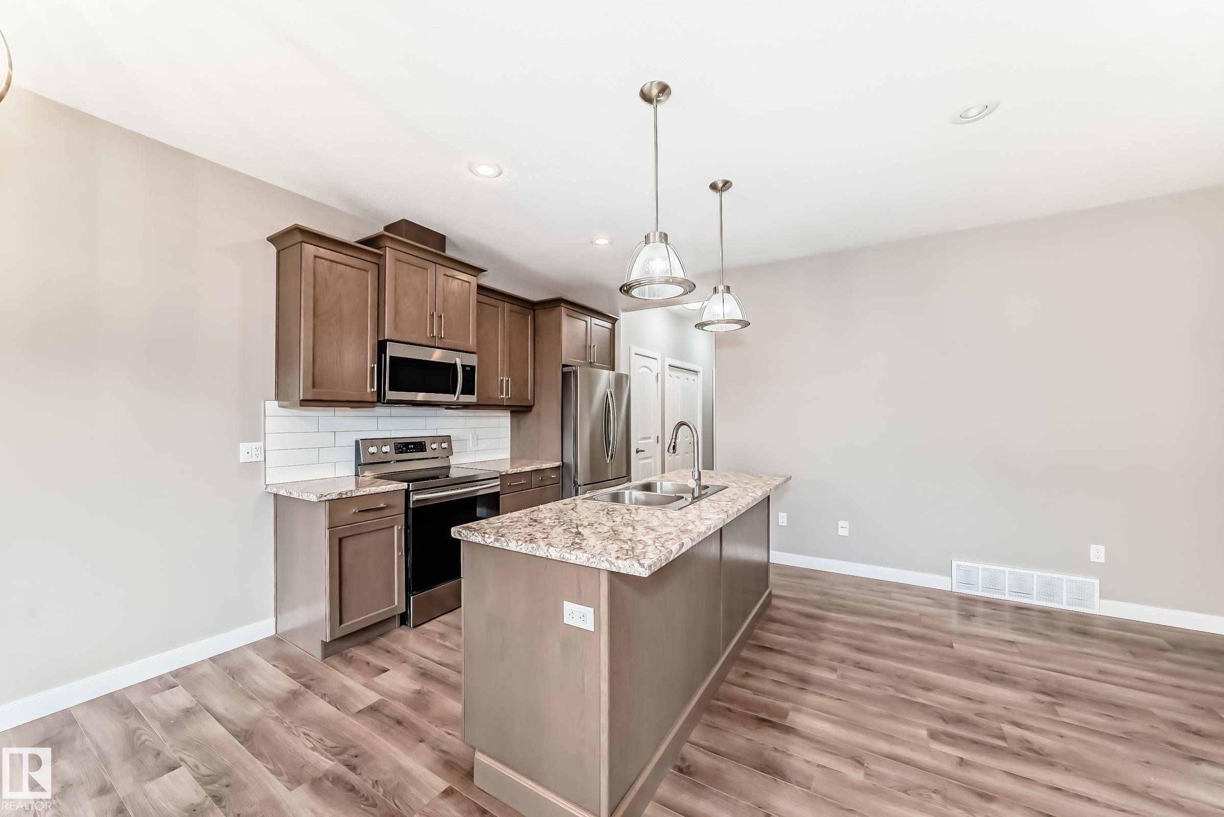 Photo 10 at 106 - 300 Awentia Drive, Deer Valley, Leduc