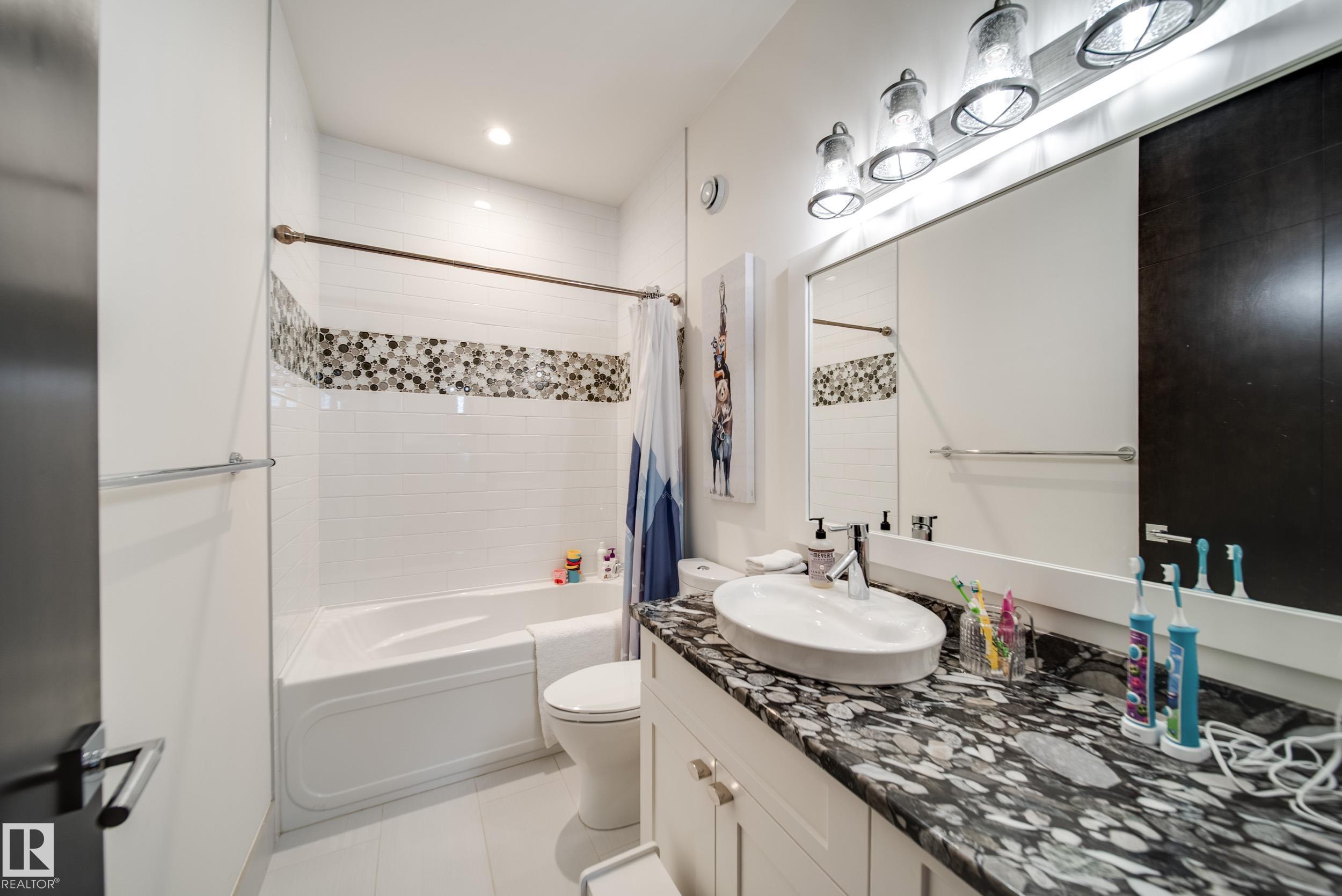 Photo 40 at 11 - 25515 Twp Road 511a, The Estates at Blackhawk, Rural Parkland County