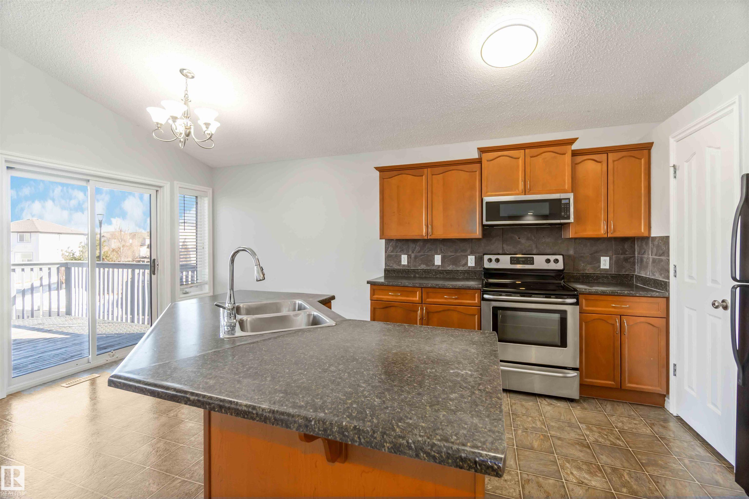 Photo 15 at 20604 48 Avenue NW, The Hamptons, Edmonton