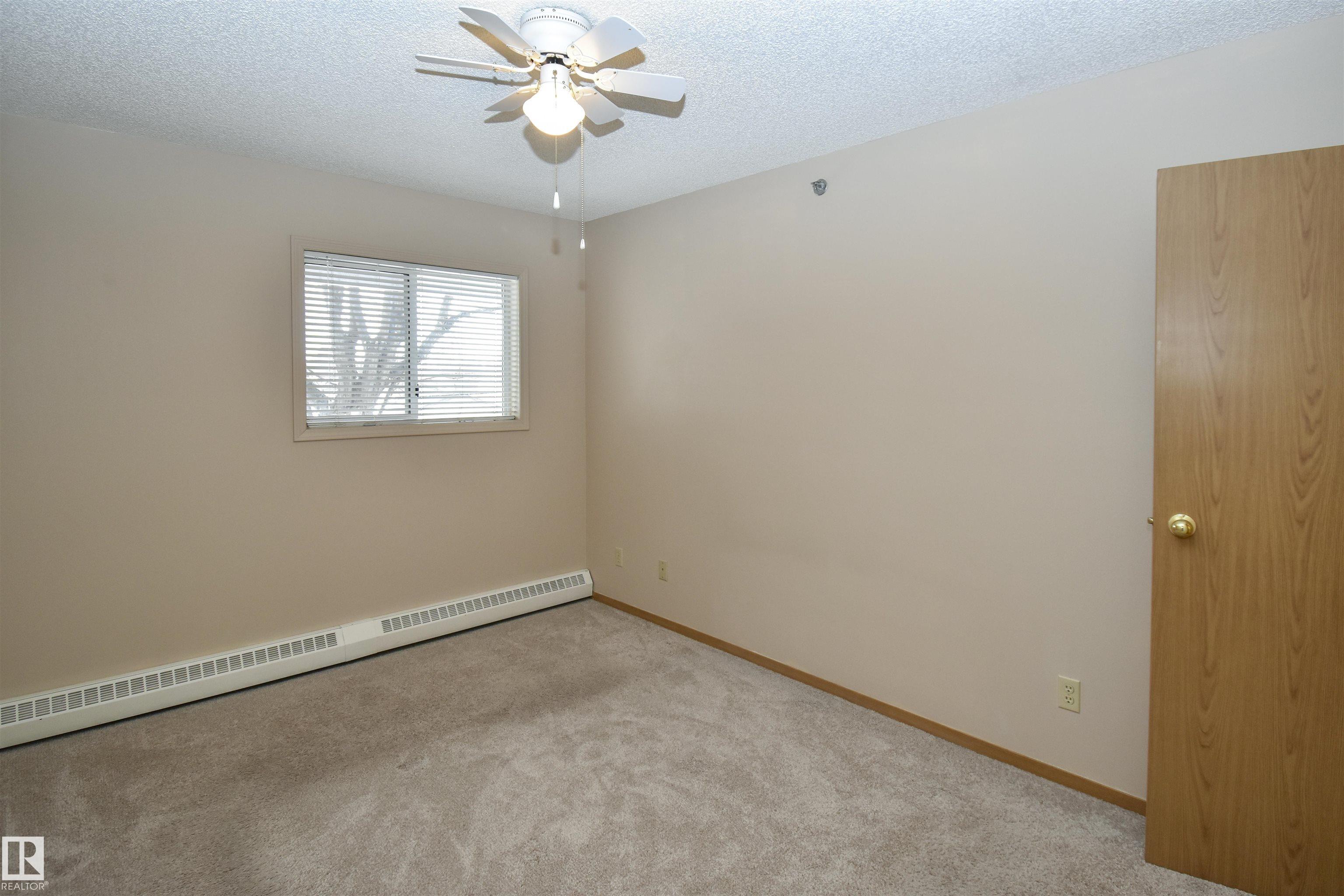 Photo 11 at 102 - 4812 51 Avenue, Downtown, Stony Plain