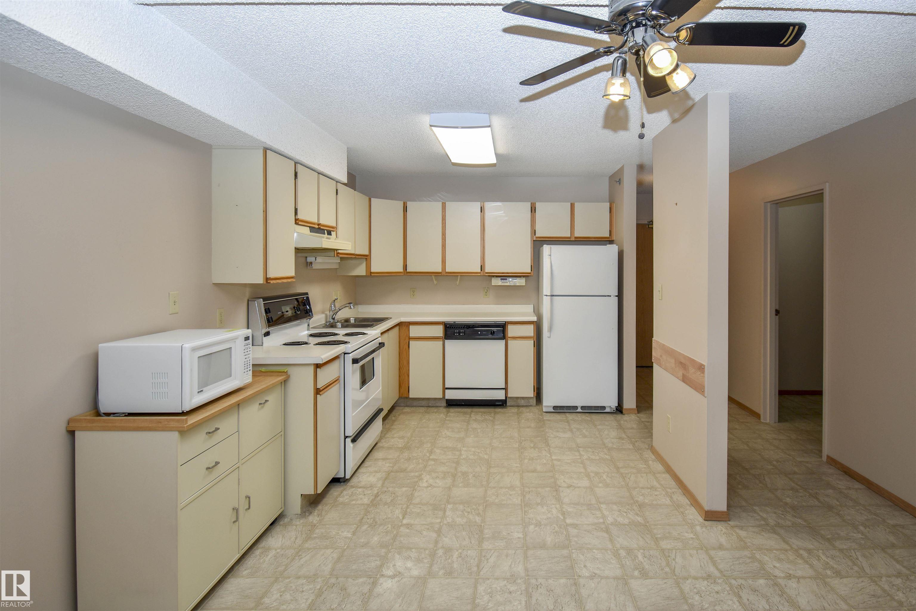 Photo 35 at 102 - 4812 51 Avenue, Downtown, Stony Plain