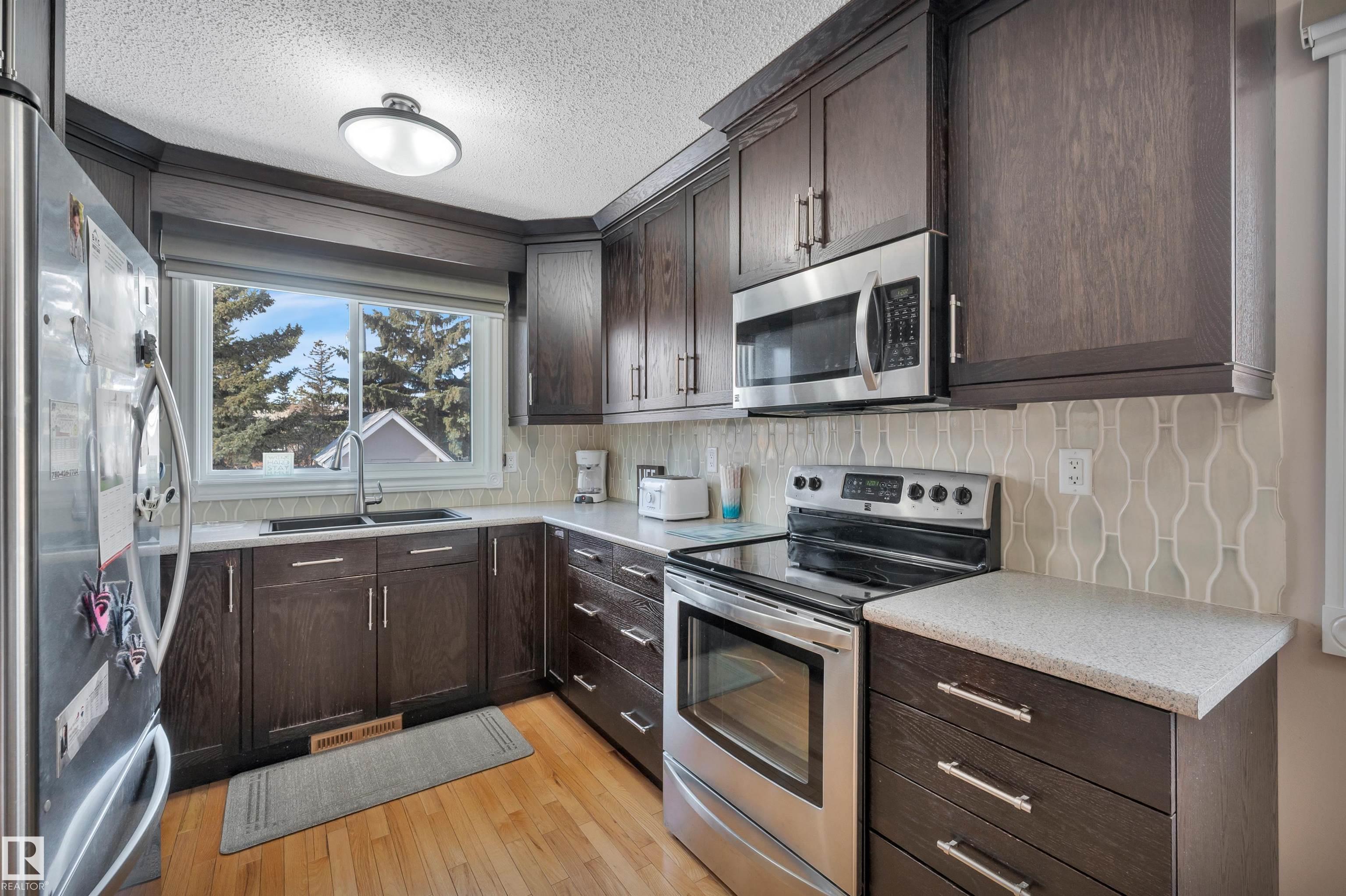 Photo 9 at 12944 28 Street NW, Kernohan, Edmonton