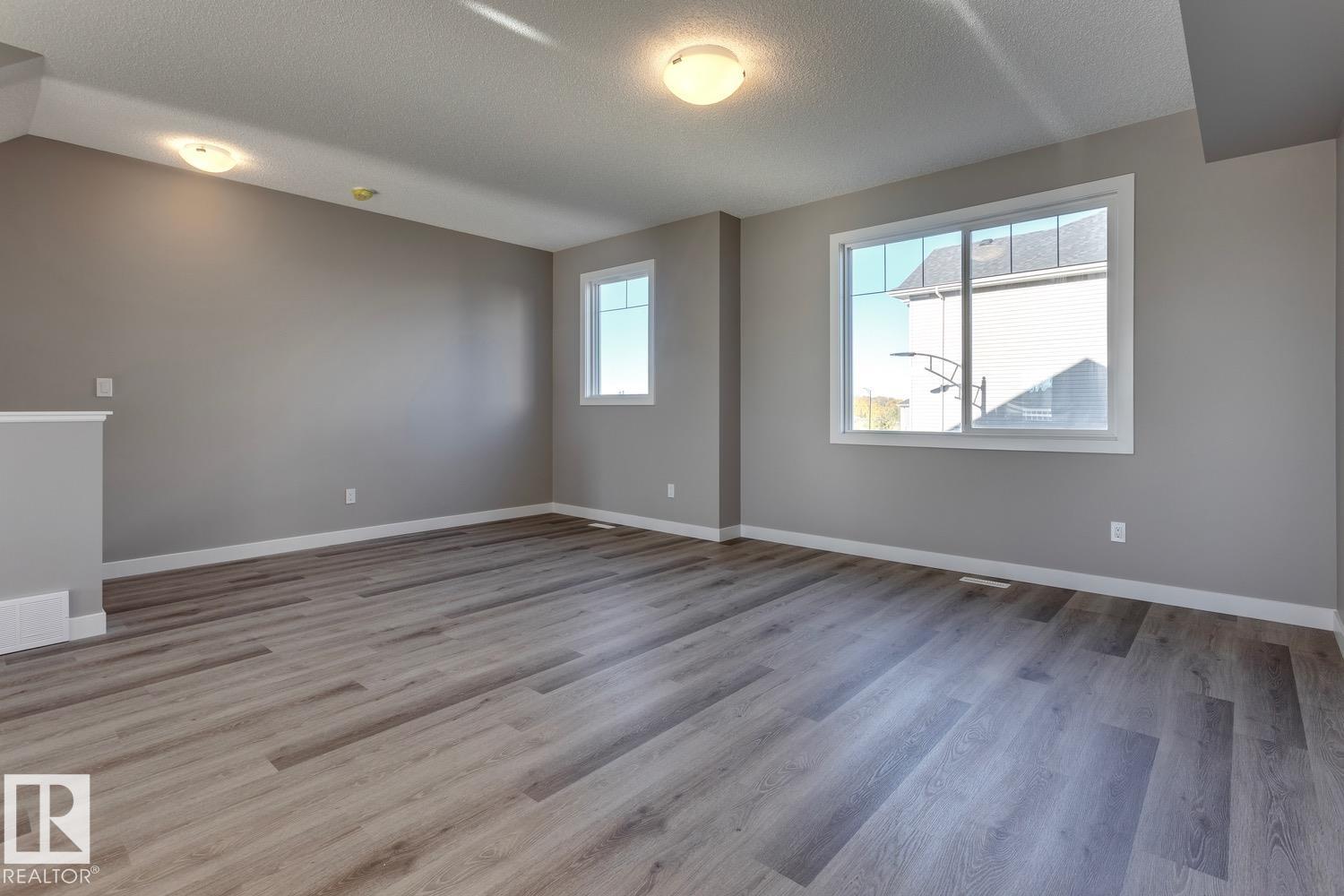 Photo 6 at 48 - 13139 205 Street NW, Trumpeter Area, Edmonton