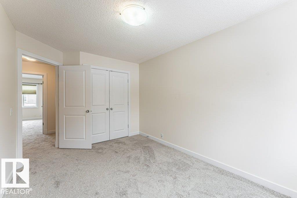 Photo 12 at 6 - 6410 134 Avenue NW, Belvedere, Edmonton