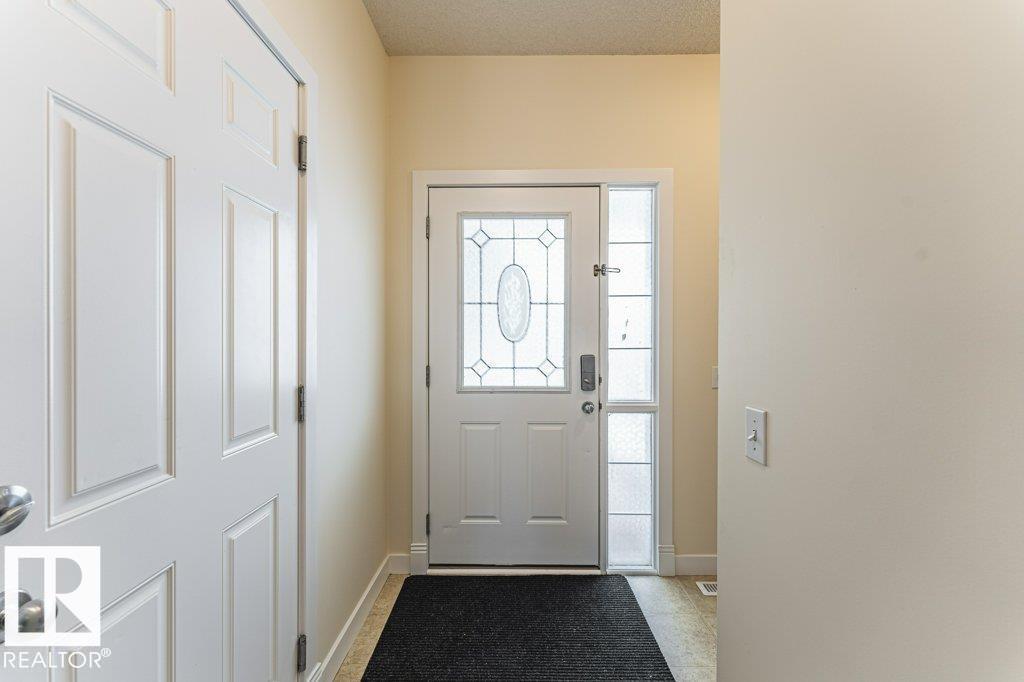 Photo 5 at 6 - 6410 134 Avenue NW, Belvedere, Edmonton