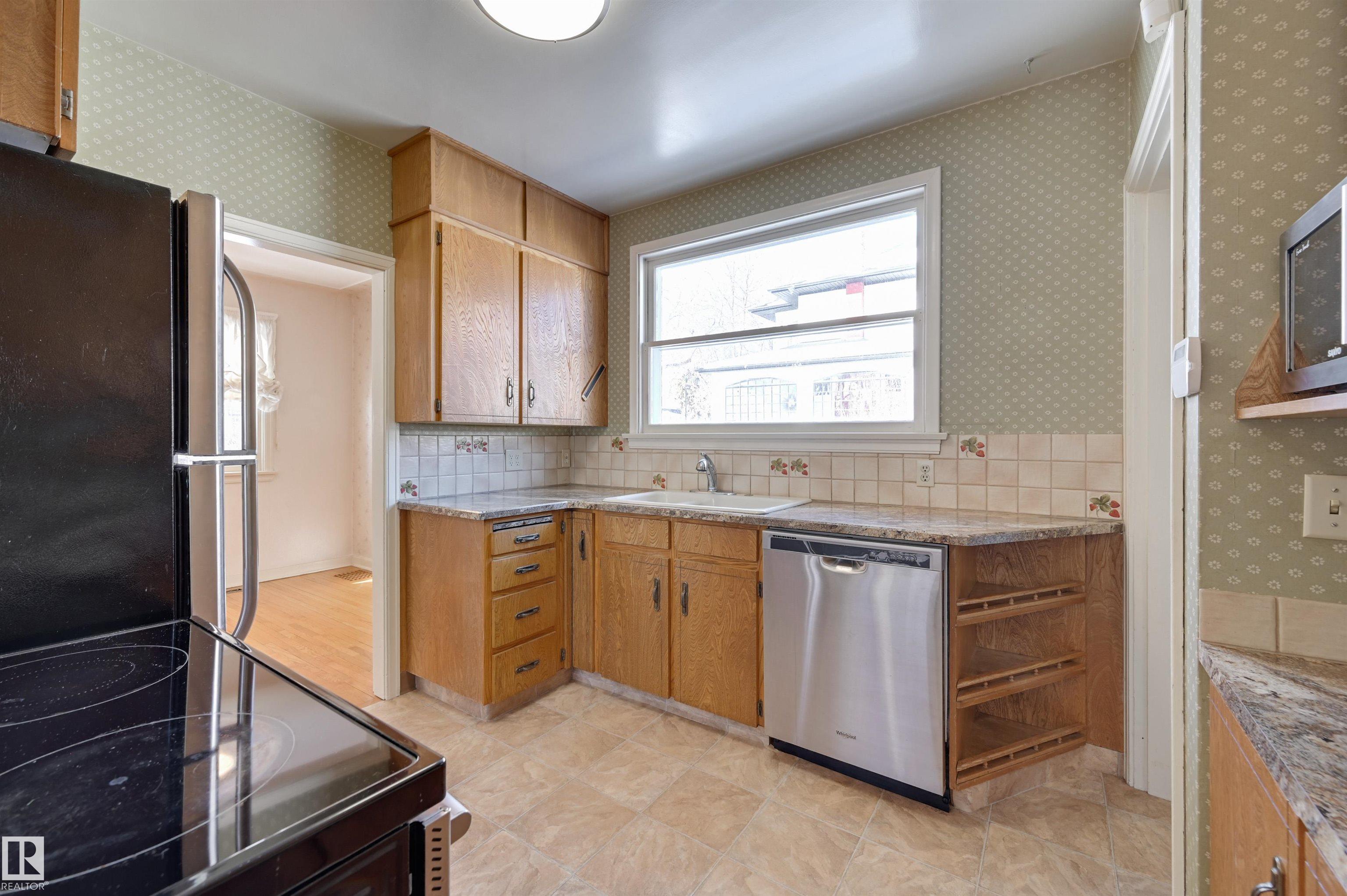 Photo 16 at 11115 60 Street NW, Highlands, Edmonton