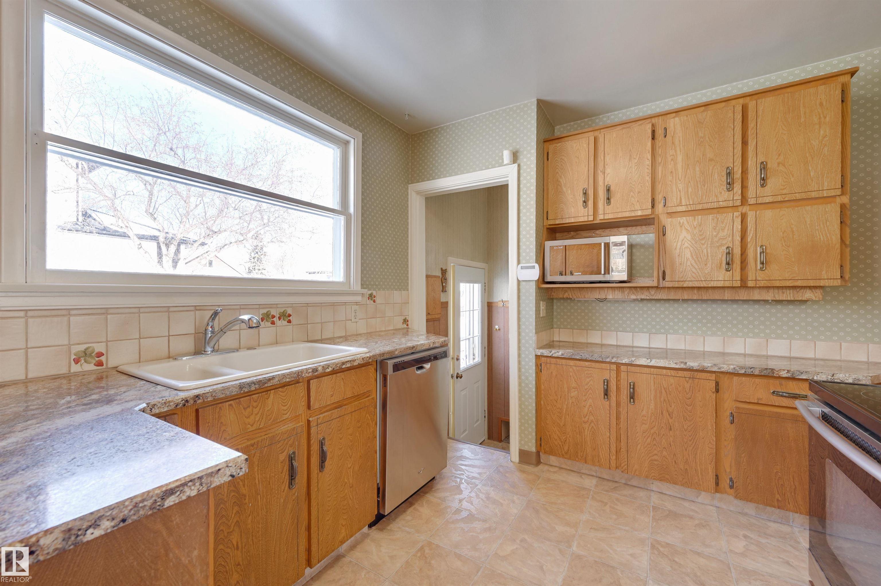 Photo 19 at 11115 60 Street NW, Highlands, Edmonton