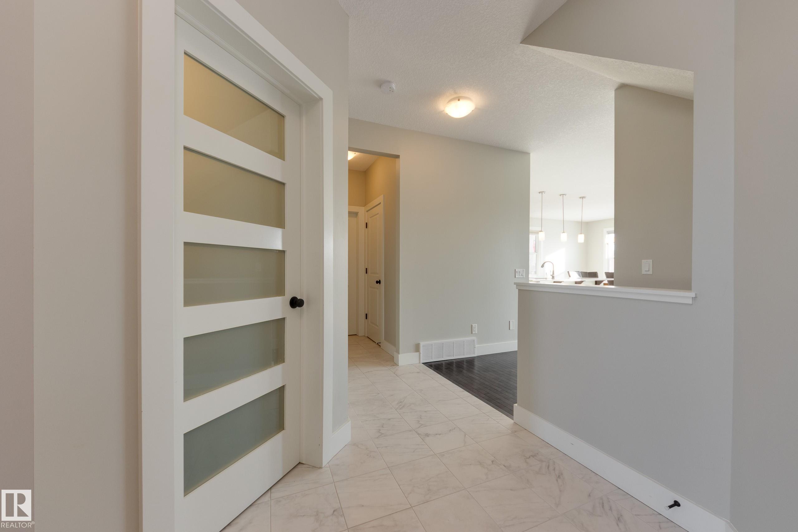 Photo 3 at 7473 Colonel Mewburn Road NW, Griesbach, Edmonton