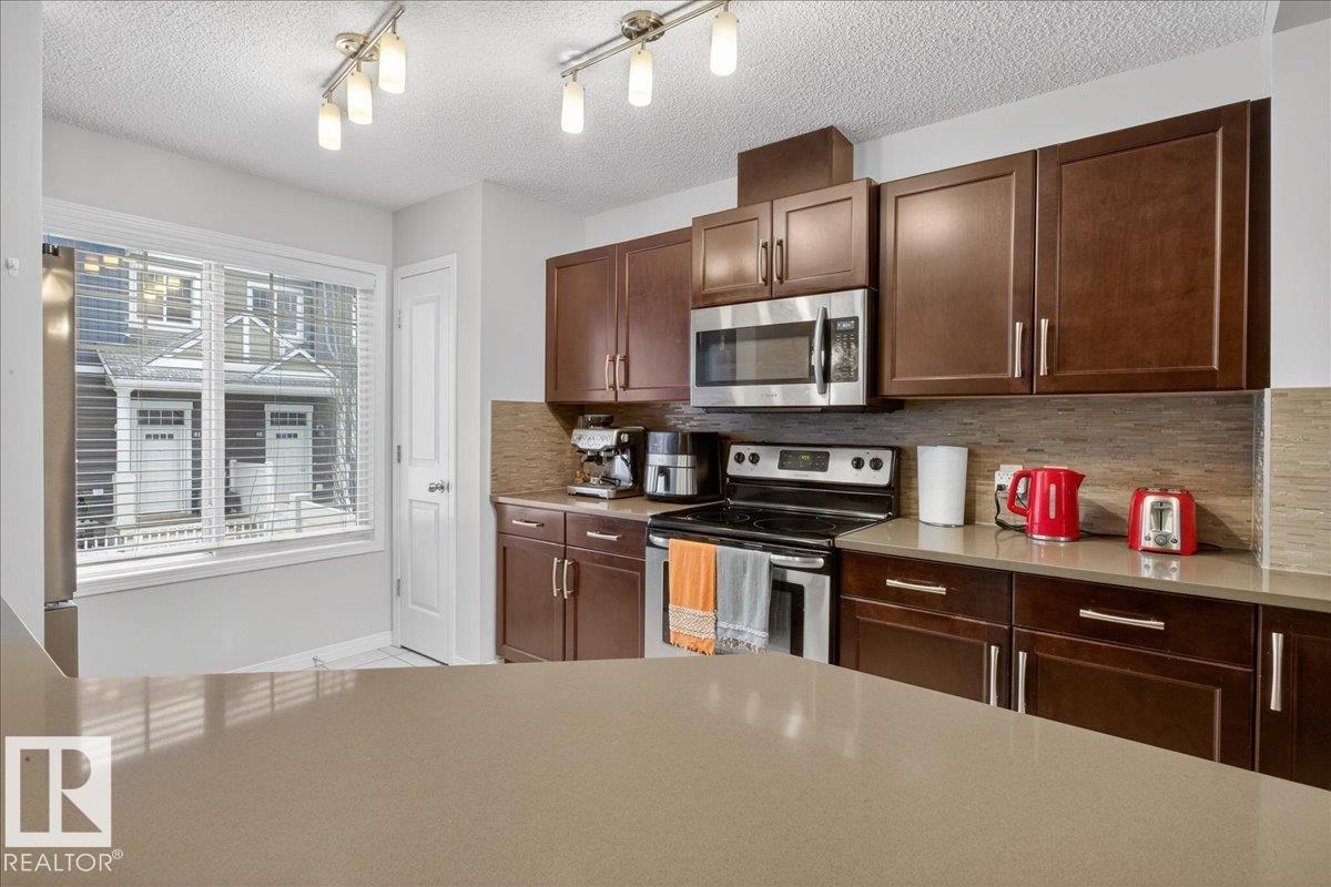 Photo 11 at 74 - 4050 Savaryn Drive SW, Summerside, Edmonton