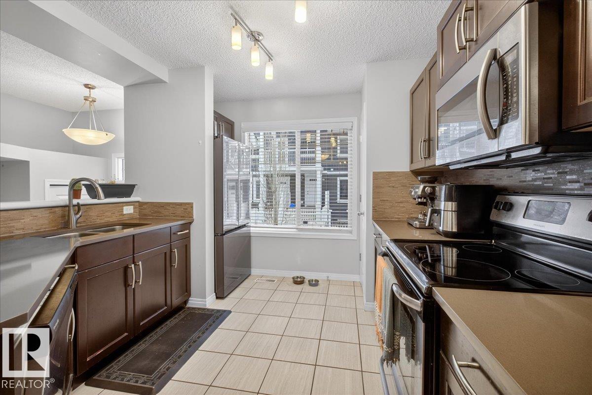 Photo 13 at 74 - 4050 Savaryn Drive SW, Summerside, Edmonton