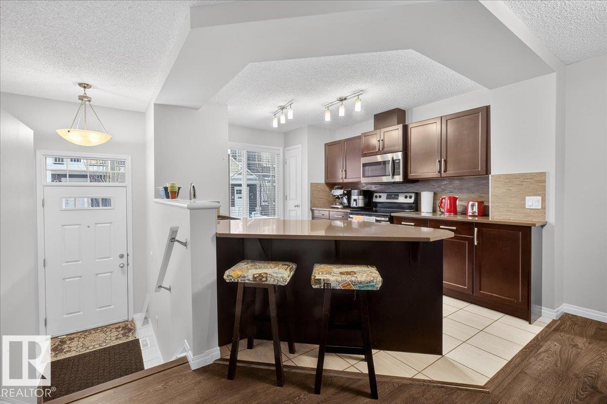 Photo 9 at 74 - 4050 Savaryn Drive SW, Summerside, Edmonton