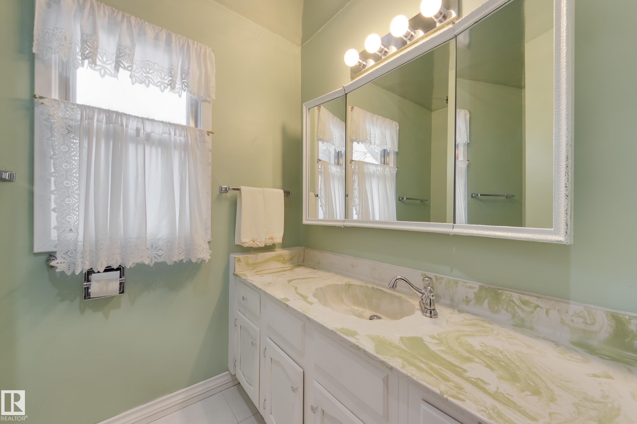 Photo 17 at 13707 102 Avenue NW, Glenora, Edmonton