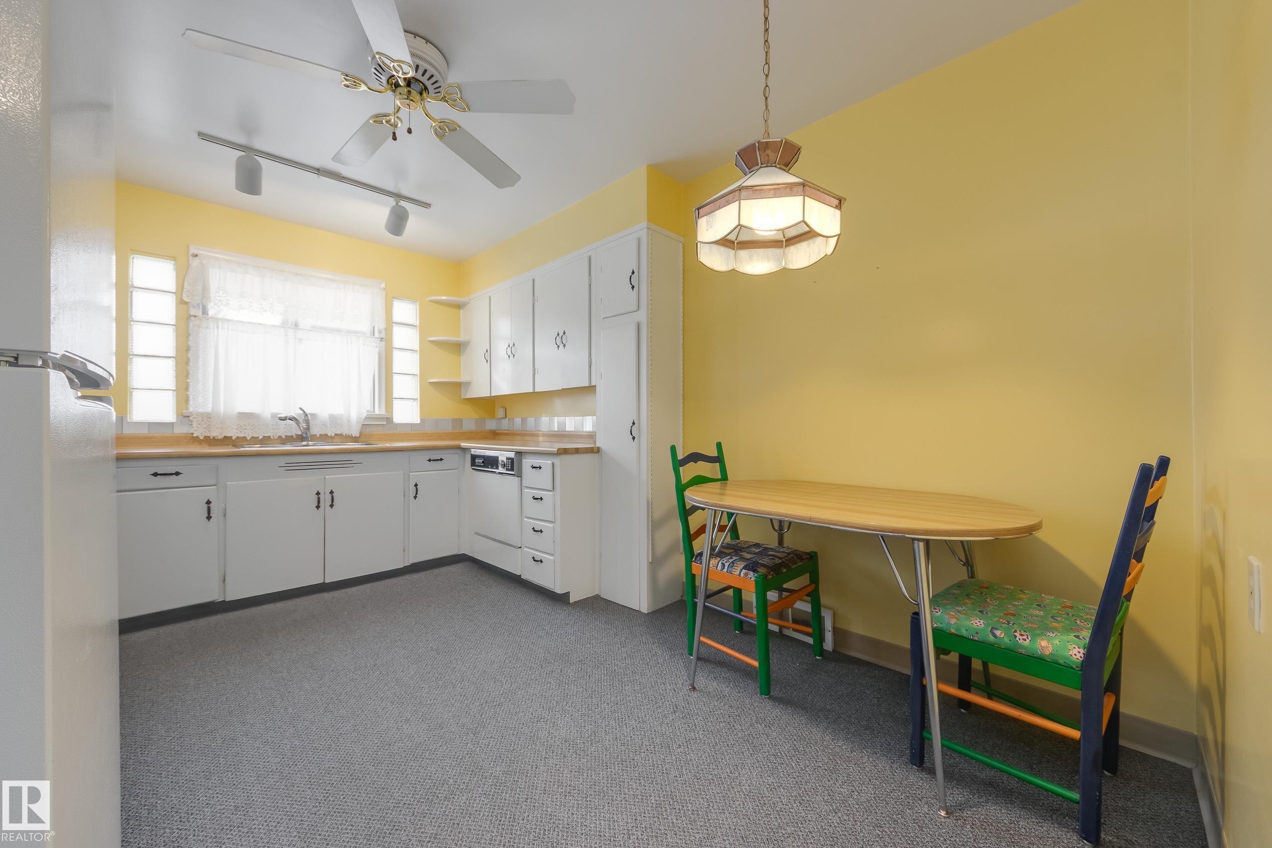 Photo 9 at 13707 102 Avenue NW, Glenora, Edmonton