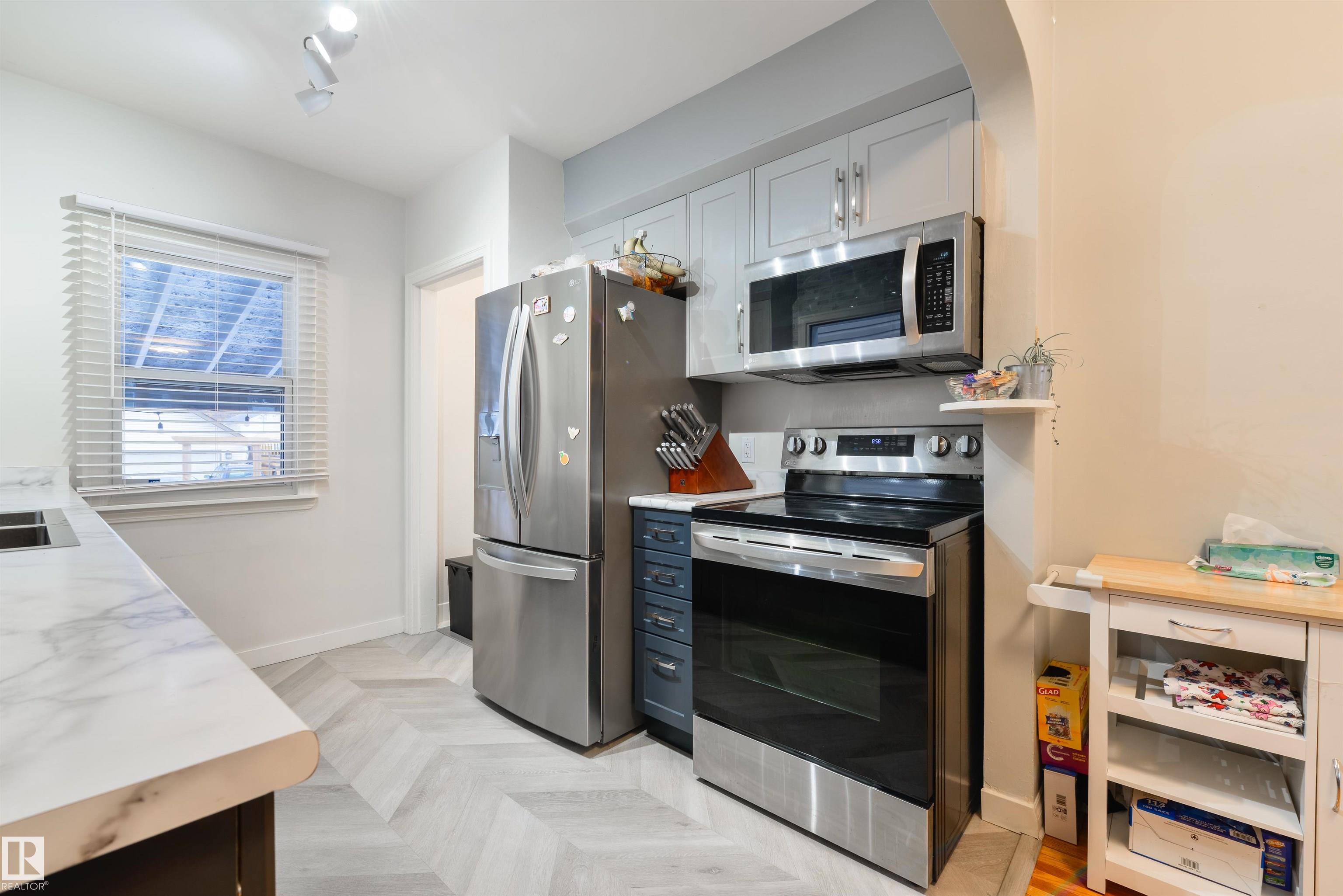 Photo 8 at 11208 66 Street NW, Highlands, Edmonton