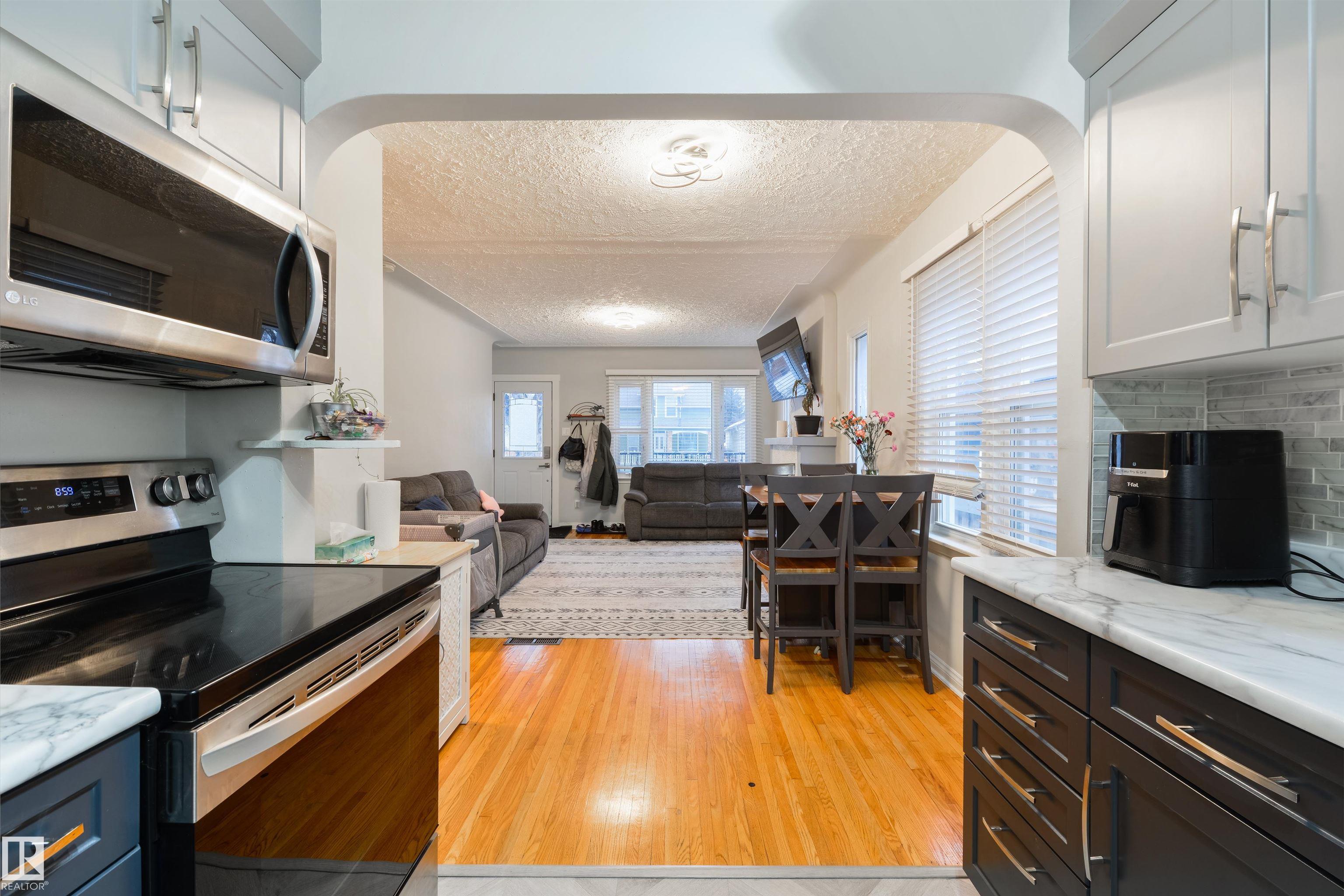 Photo 9 at 11208 66 Street NW, Highlands, Edmonton